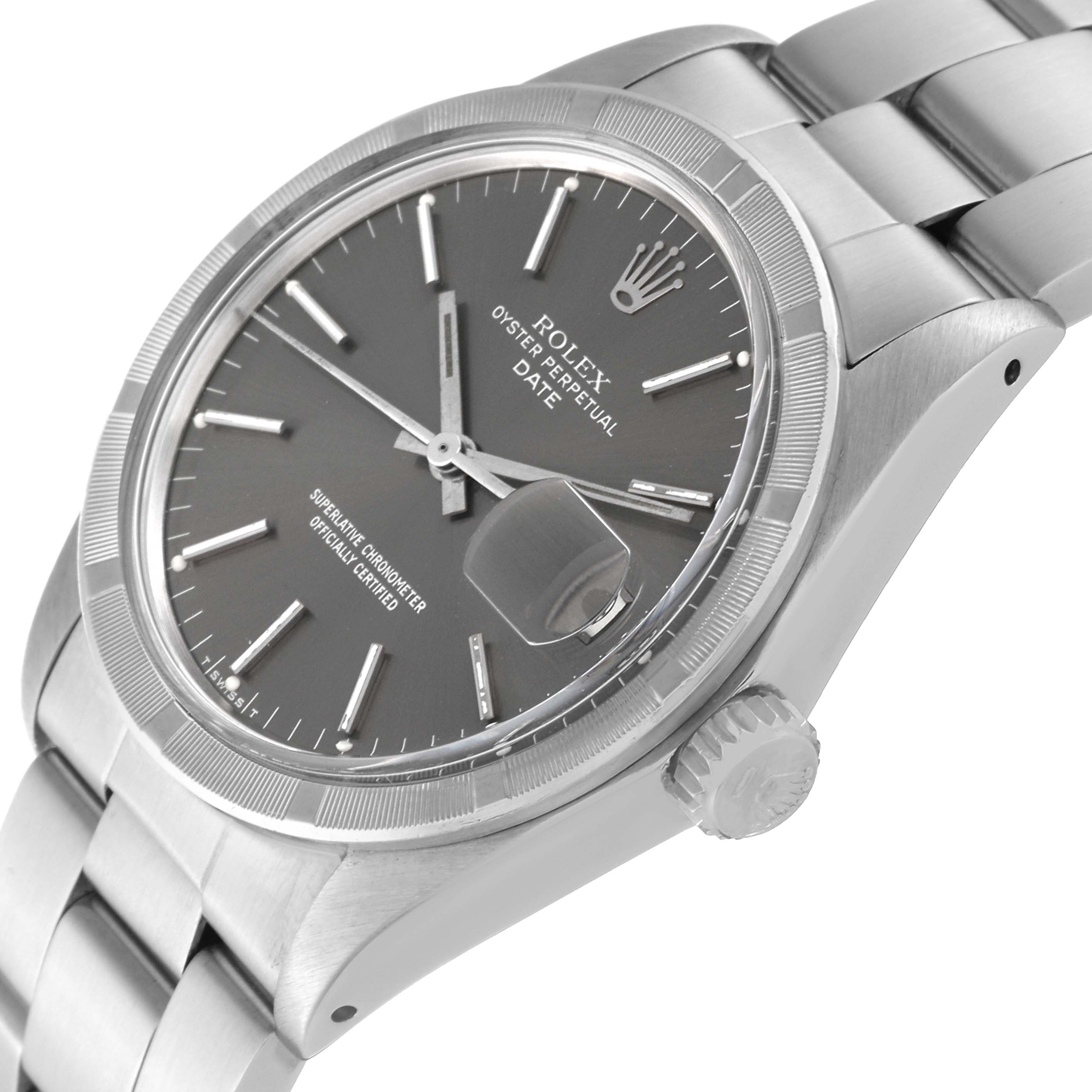 This Rolex Date 1501 Men
s Stainless Steel Grey Dial 1501 Men
s Stainless Steel Grey Dial model is viewed at an angle showing the dial, bezel, crown, and part of the bracelet.