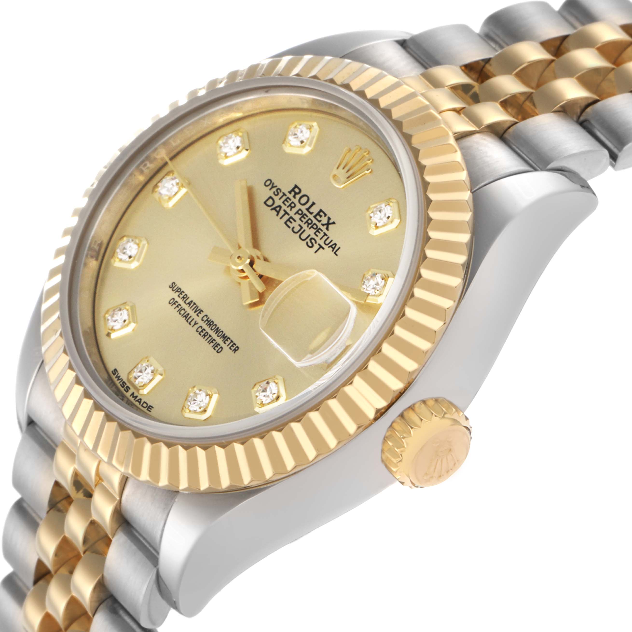The Rolex Datejust model 279173 is shown at an angled side view, highlighting its gold and stainless steel case, fluted bezel, champagne dial, and jubilee bracelet.