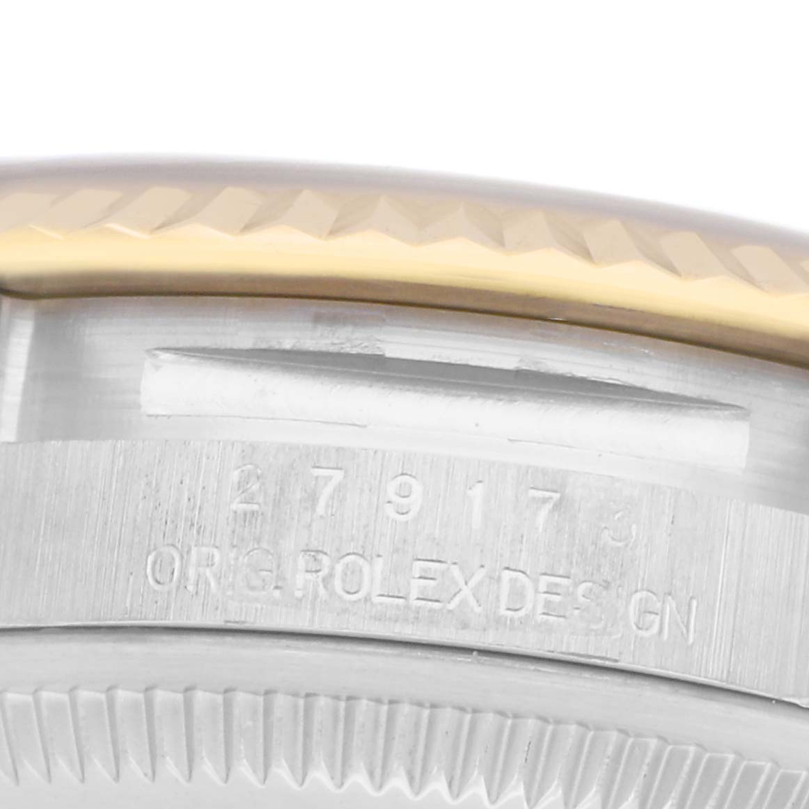 The image shows a close-up of the case edge, bezel, and the engraved model number "279173" on the Rolex Datejust watch.