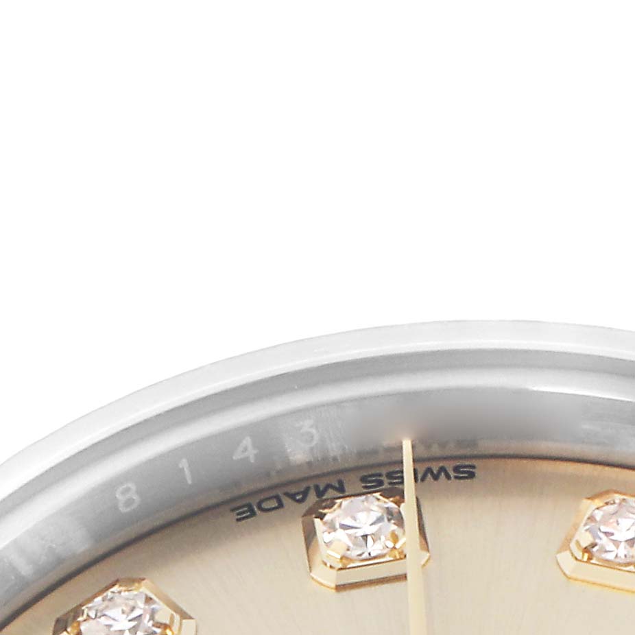 The image shows a close-up of the dial edge of a Rolex Datejust model 279173, highlighting the "Swiss Made" text and diamond hour markers from an oblique angle.