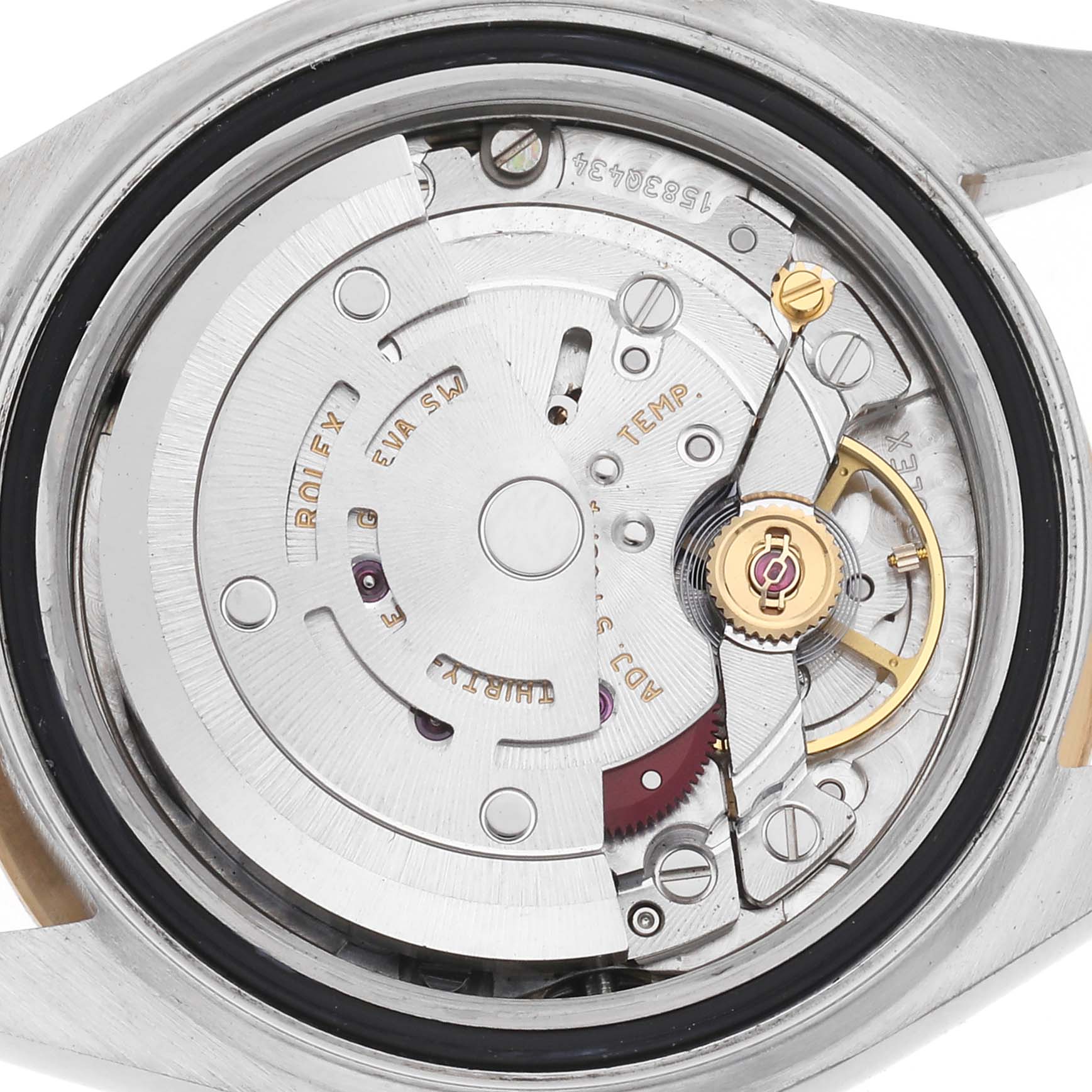 The image shows the movement of a Rolex Datejust model 279173, featuring the rotor, balance wheel, and various gears from the back side.