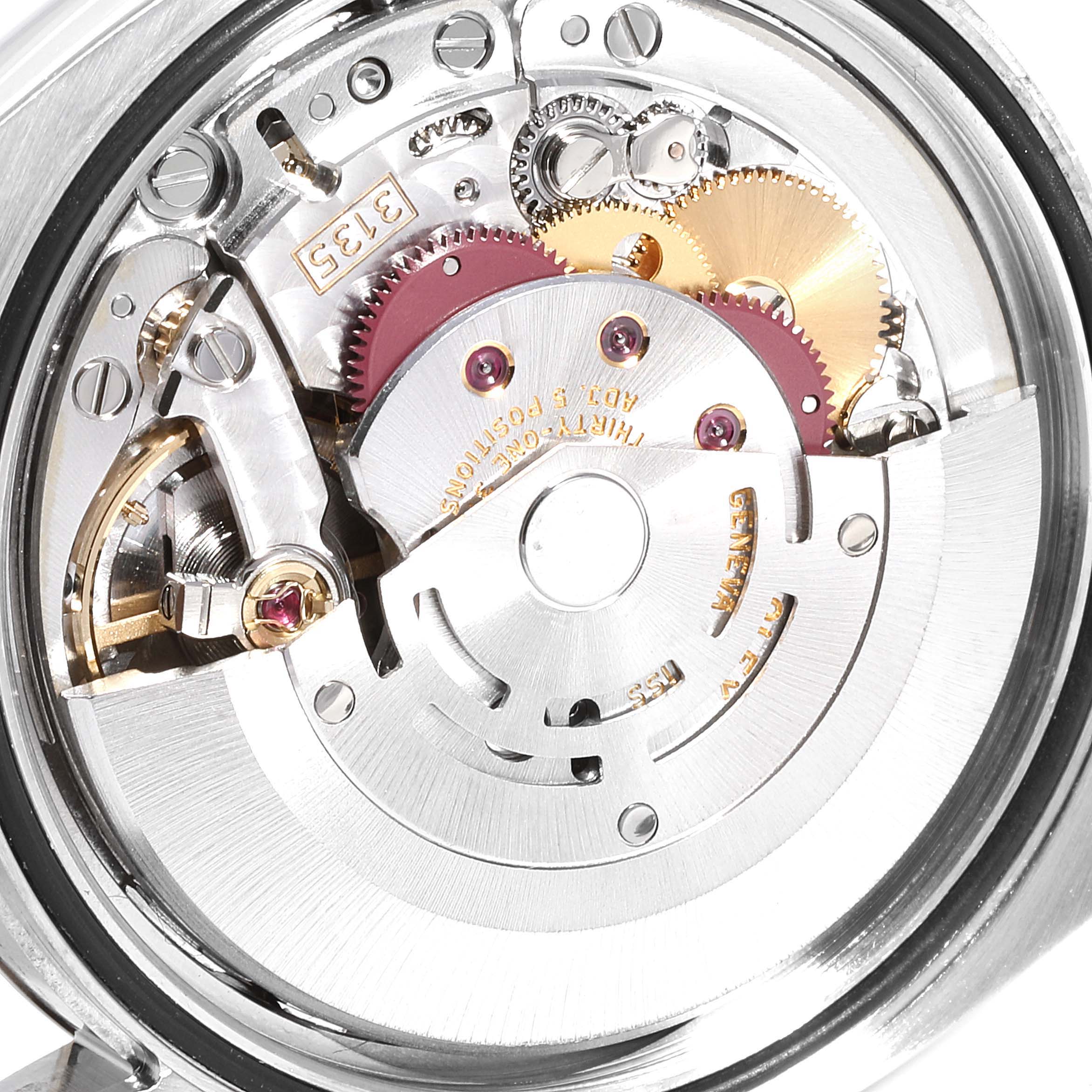 The image shows the internal movement mechanism of a Rolex Datejust 116233 Men
s Steel and Gold (two tone) Champagne Dial 116233 Men
s Steel and Gold (two tone) Champagne Dial watch, viewed from the back.