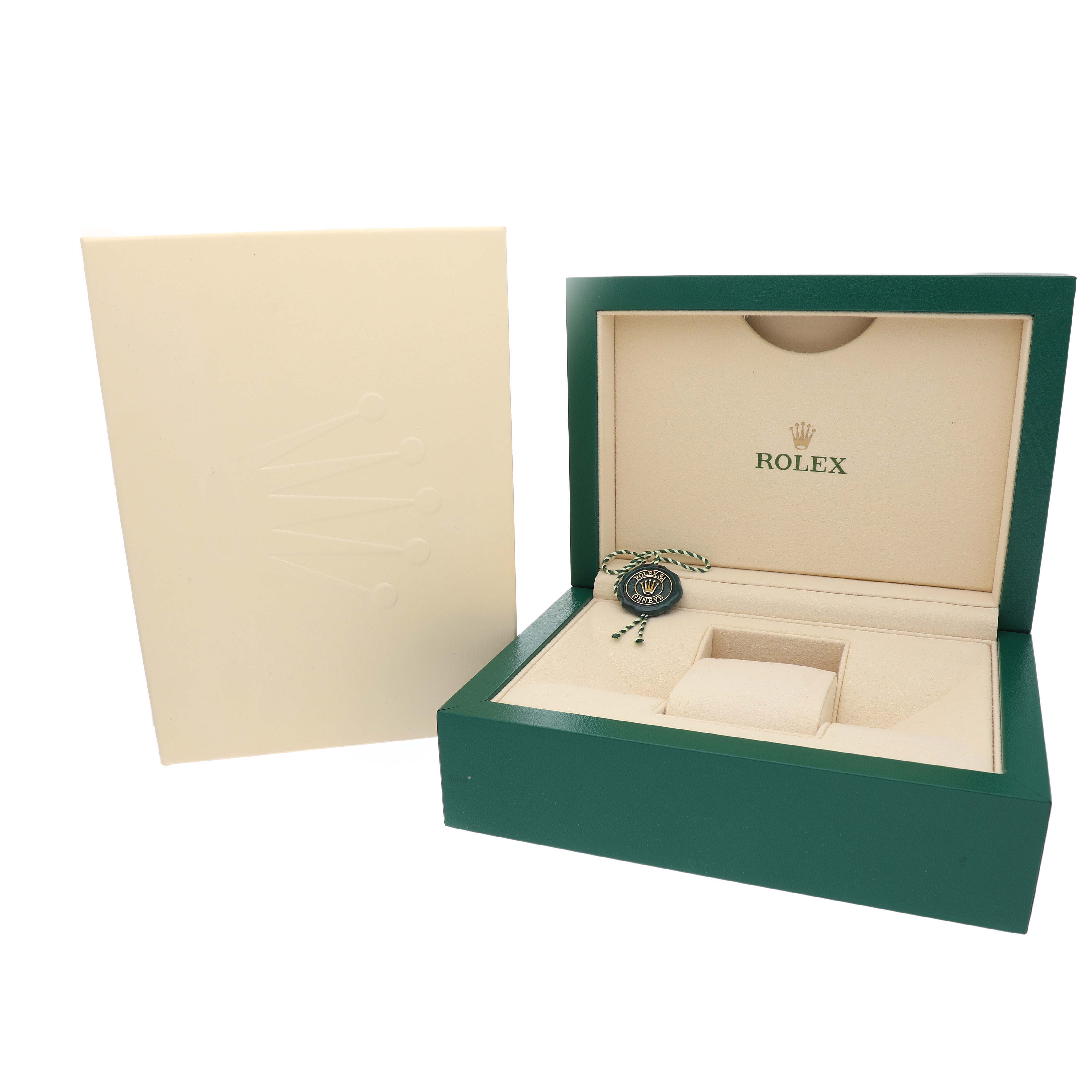 The image shows the open box and cover lid for a Rolex Datejust 126283 Men's Steel and Gold (two tone) Silver Dial watch, featuring the Rolex logo and a tag inside the box.