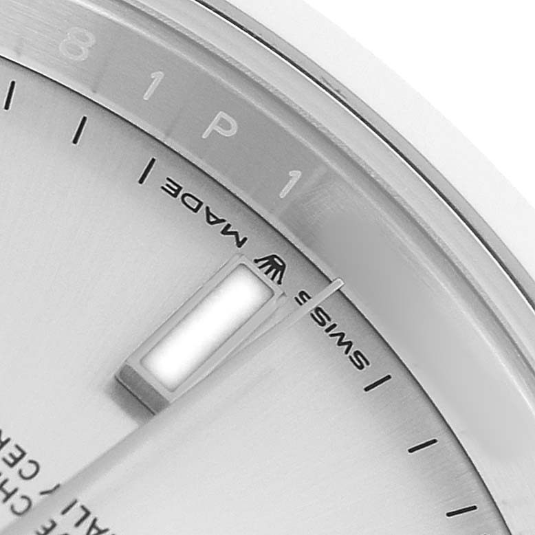 The image shows a close-up of the dial edge and hands of a Rolex Datejust 41 126300 Men's Stainless Steel Grey Dial, focusing on the hour markers and part of the "Swiss Made" text.