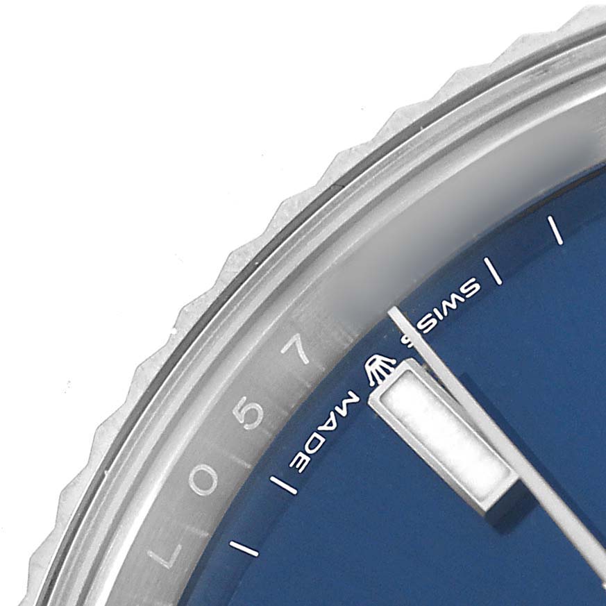 The image shows a close-up of the dial and bezel of a Rolex Datejust 41 126334 Men's Stainless Steel Blue Dial, highlighting the blue dial and silver hour markers.