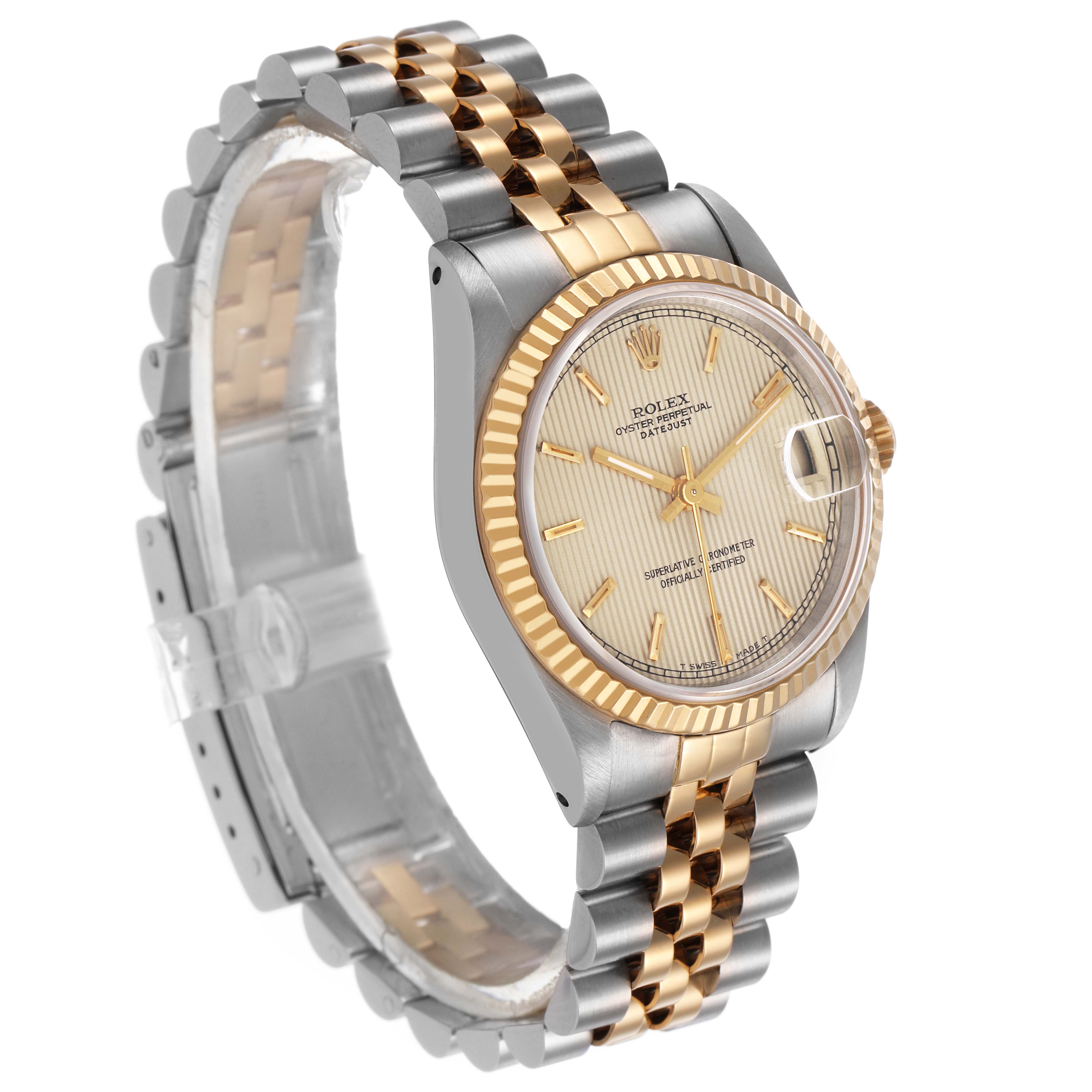 The image shows a Rolex Datejust 68273 Women's Steel and Gold (two tone) Champagne Dial watch at a side angle, highlighting the bezel, dial, and Jubilee bracelet.