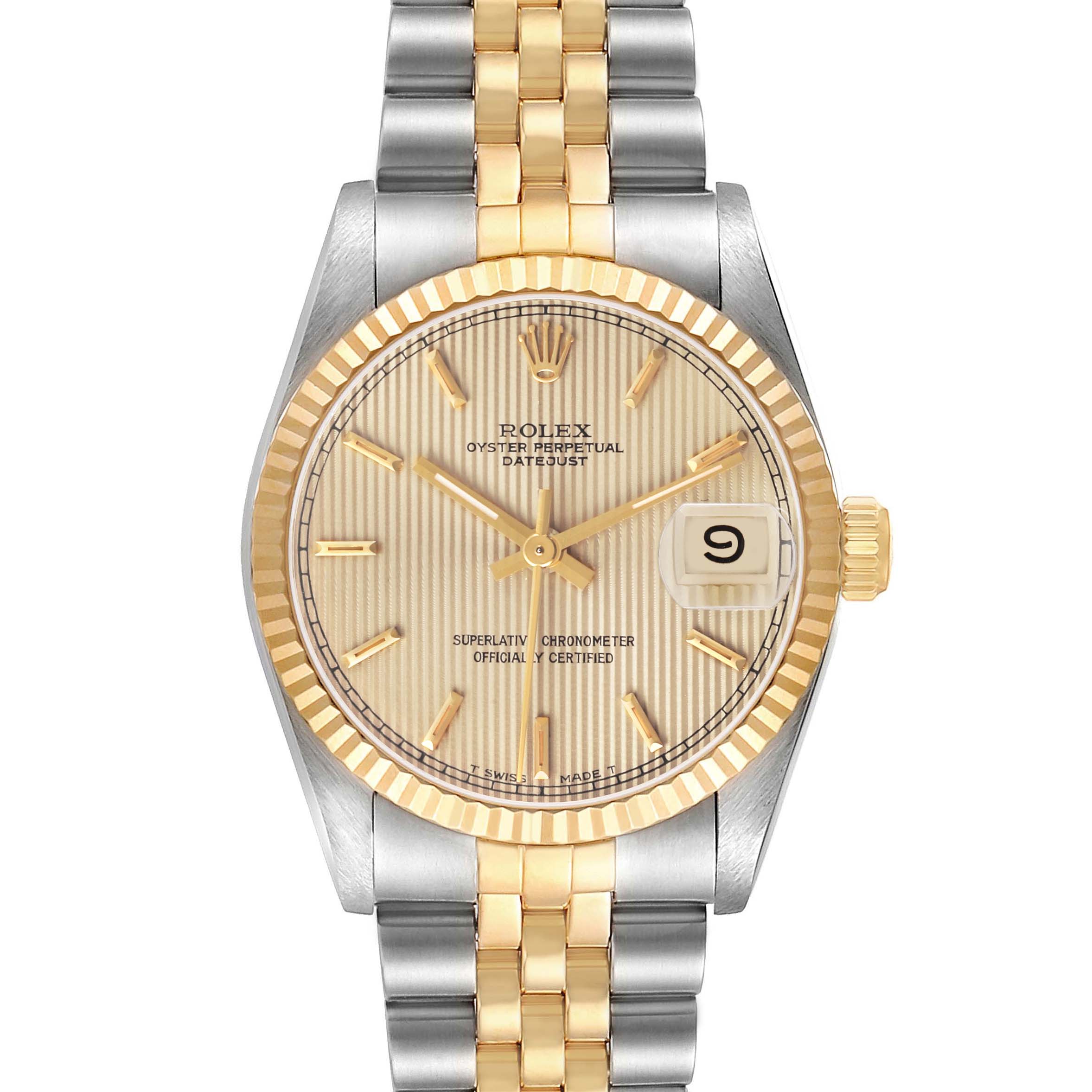 The Rolex Datejust 68273 Women's Steel and Gold (two tone) Champagne Dial watch is shown from a front angle, displaying its dial, fluted bezel, and two-tone bracelet.