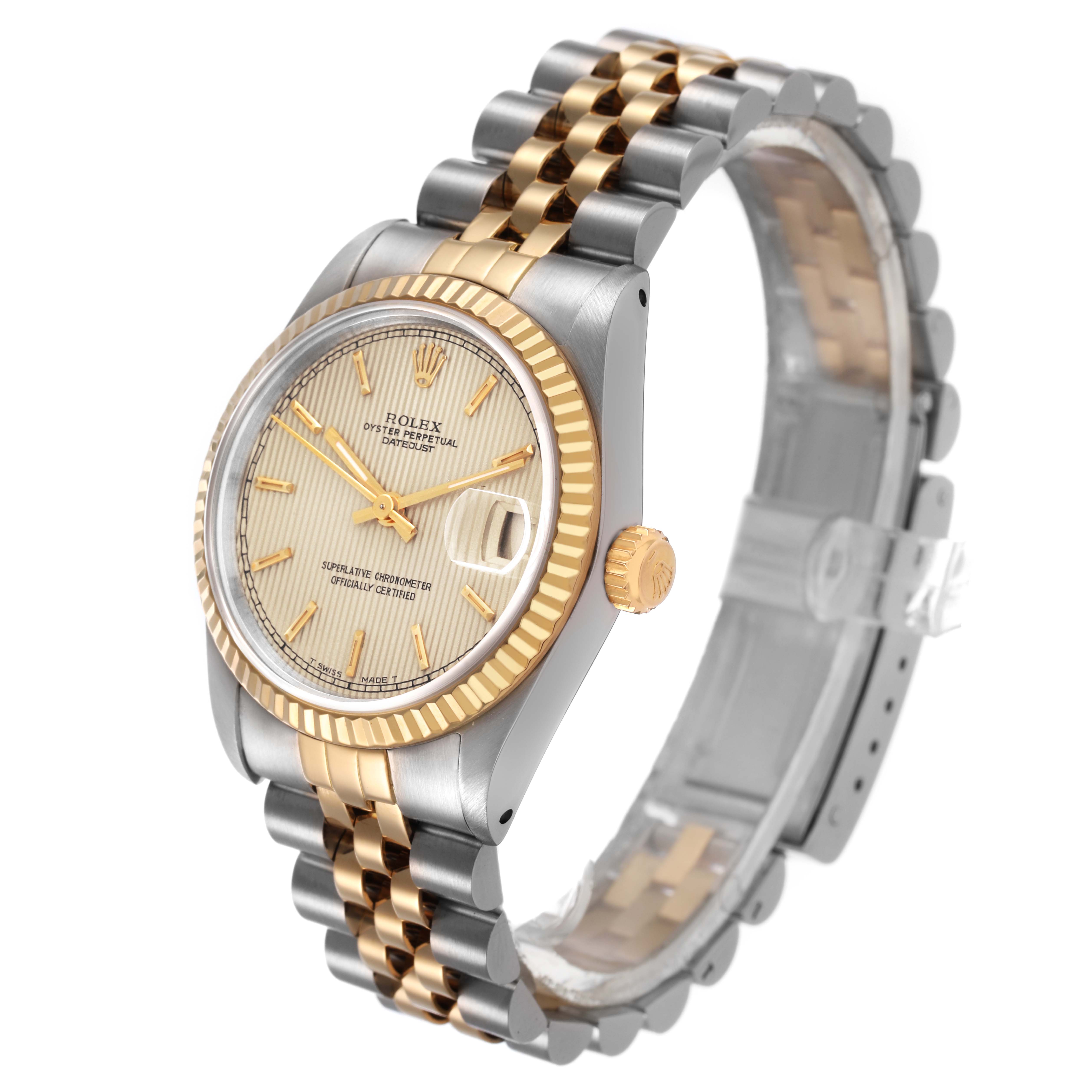 This image shows a Rolex Datejust 68273 Women's Steel and Gold (two tone) Champagne Dial watch from an angled side view, highlighting the dial, bezel, crown, and two-tone bracelet.