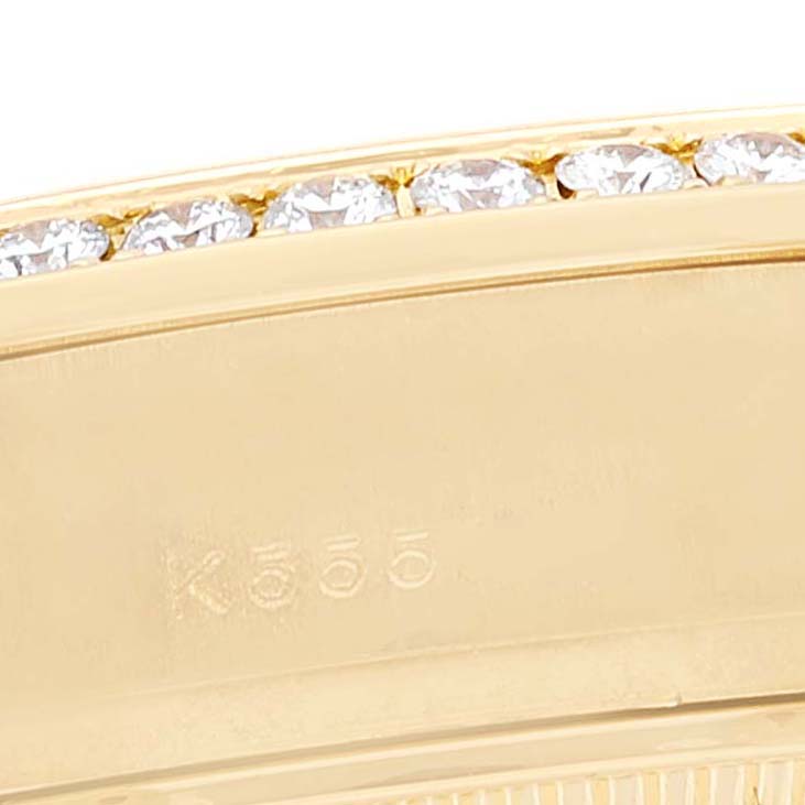 This close-up image shows the gold bezel with diamonds and partial casing of the Rolex President 179178 Women
s Yellow Gold Champagne Dial 179178 Women
s Yellow Gold Champagne Dial model watch.
