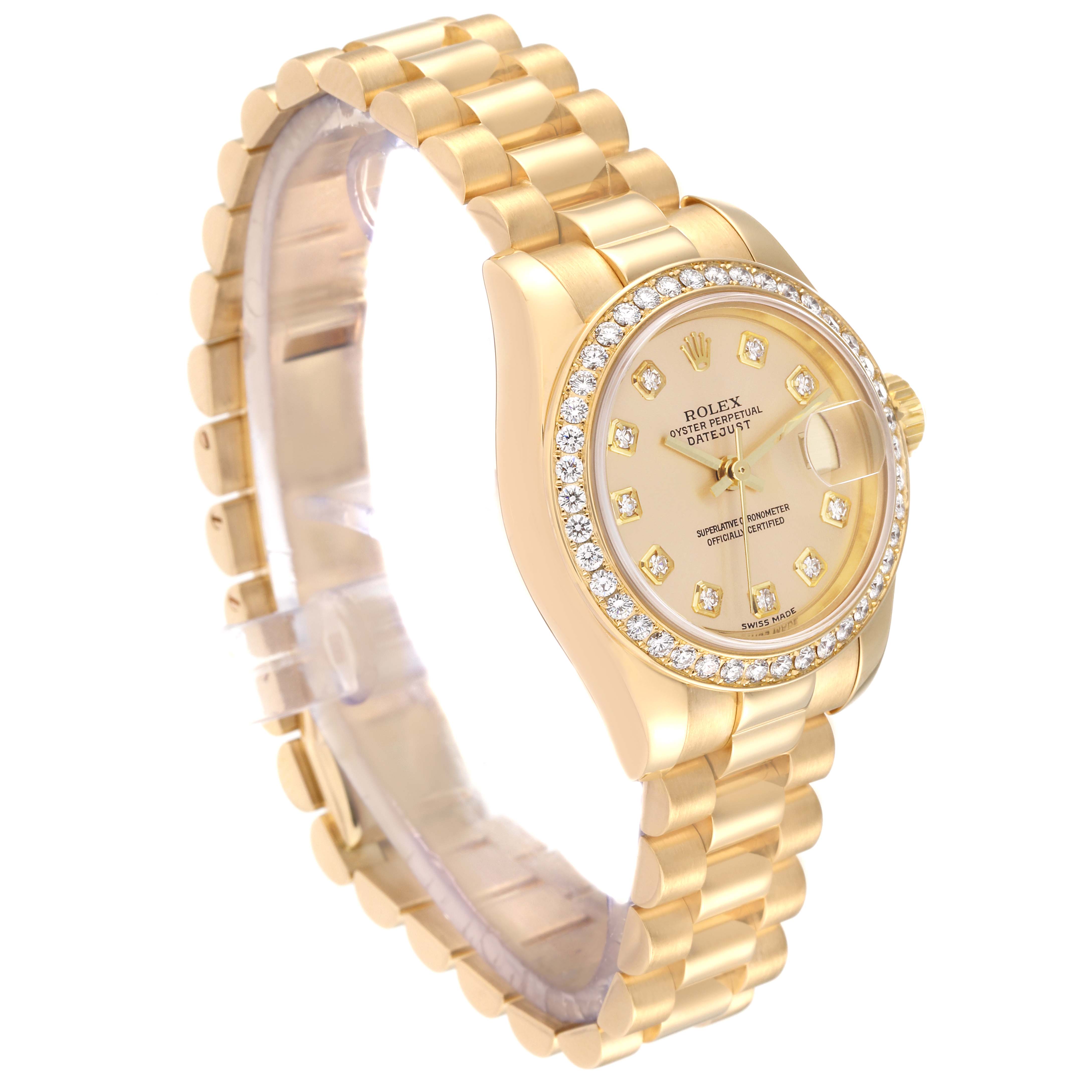 The Rolex President 179178 Women
s Yellow Gold Champagne Dial 179178 Women
s Yellow Gold Champagne Dial model watch is shown at a slight angle, displaying the gold bracelet, diamond bezel, and gold dial.