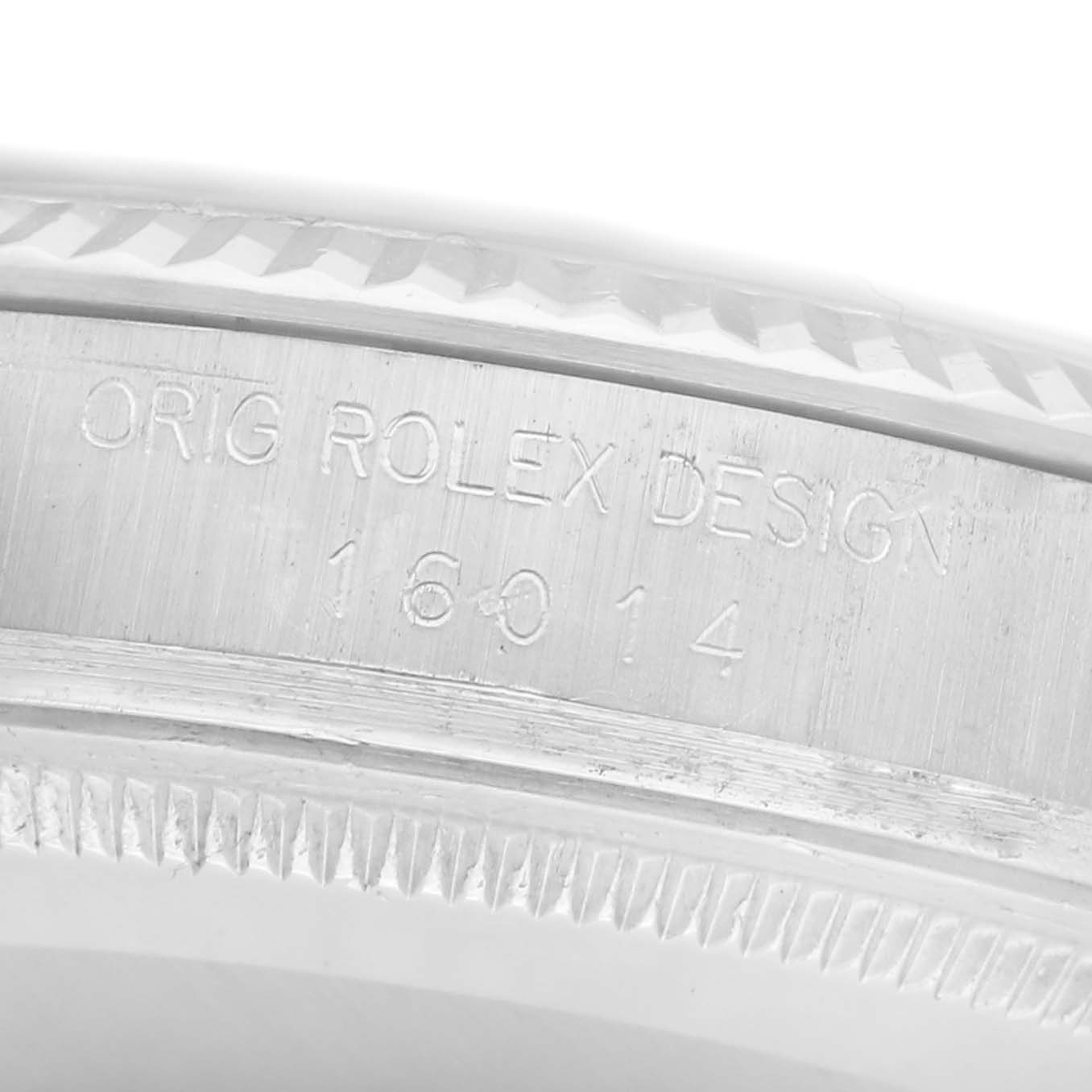 The image shows a close-up of the Rolex Vintage Collection model 16014, focusing on the engraved bezel with "ORIG ROLEX DESIGN" and the model number.