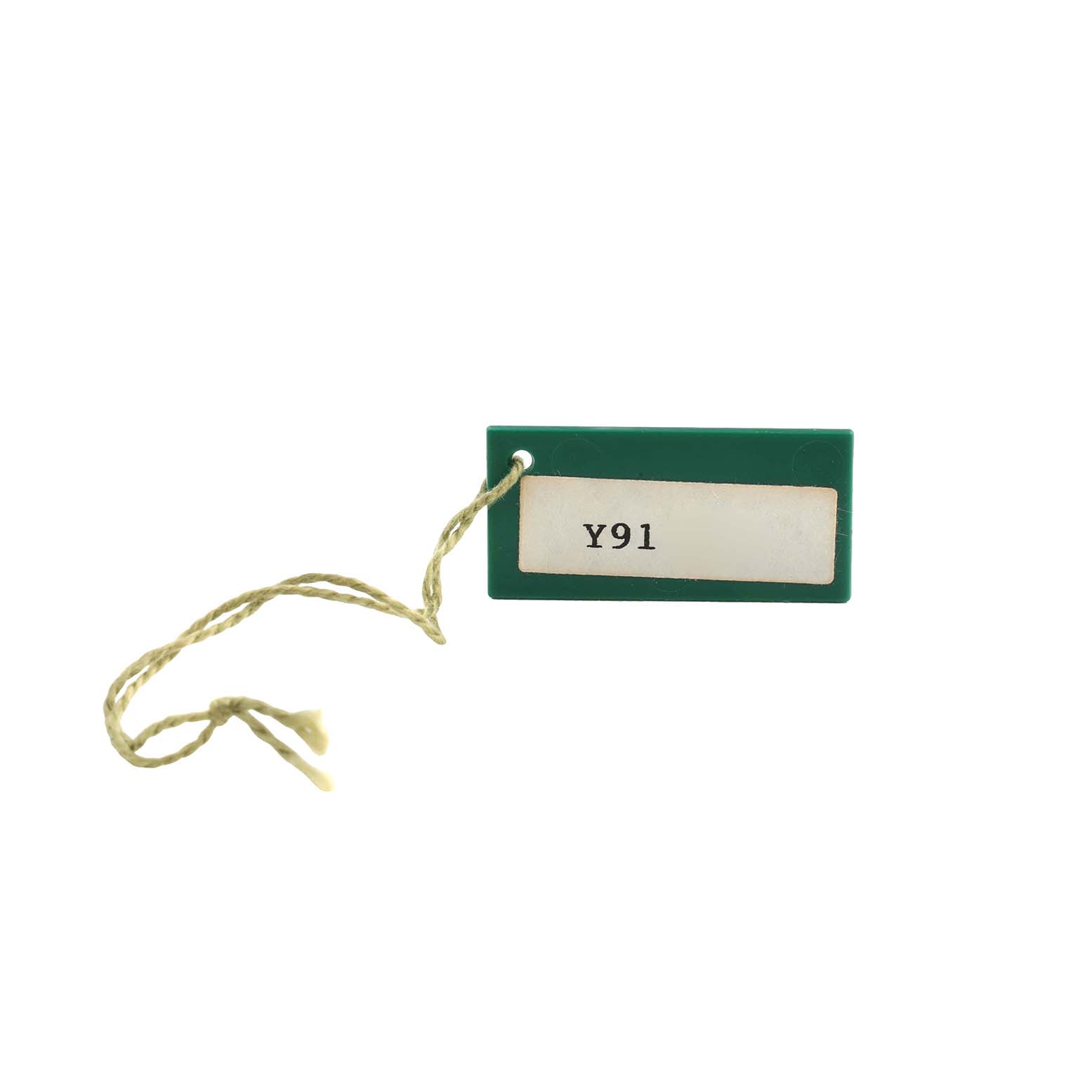 The image shows a green hang tag with a string, labeled "Y91," related to a Rolex Datejust 79163 Men's Steel and Gold (two tone) Champagne Dial watch.
