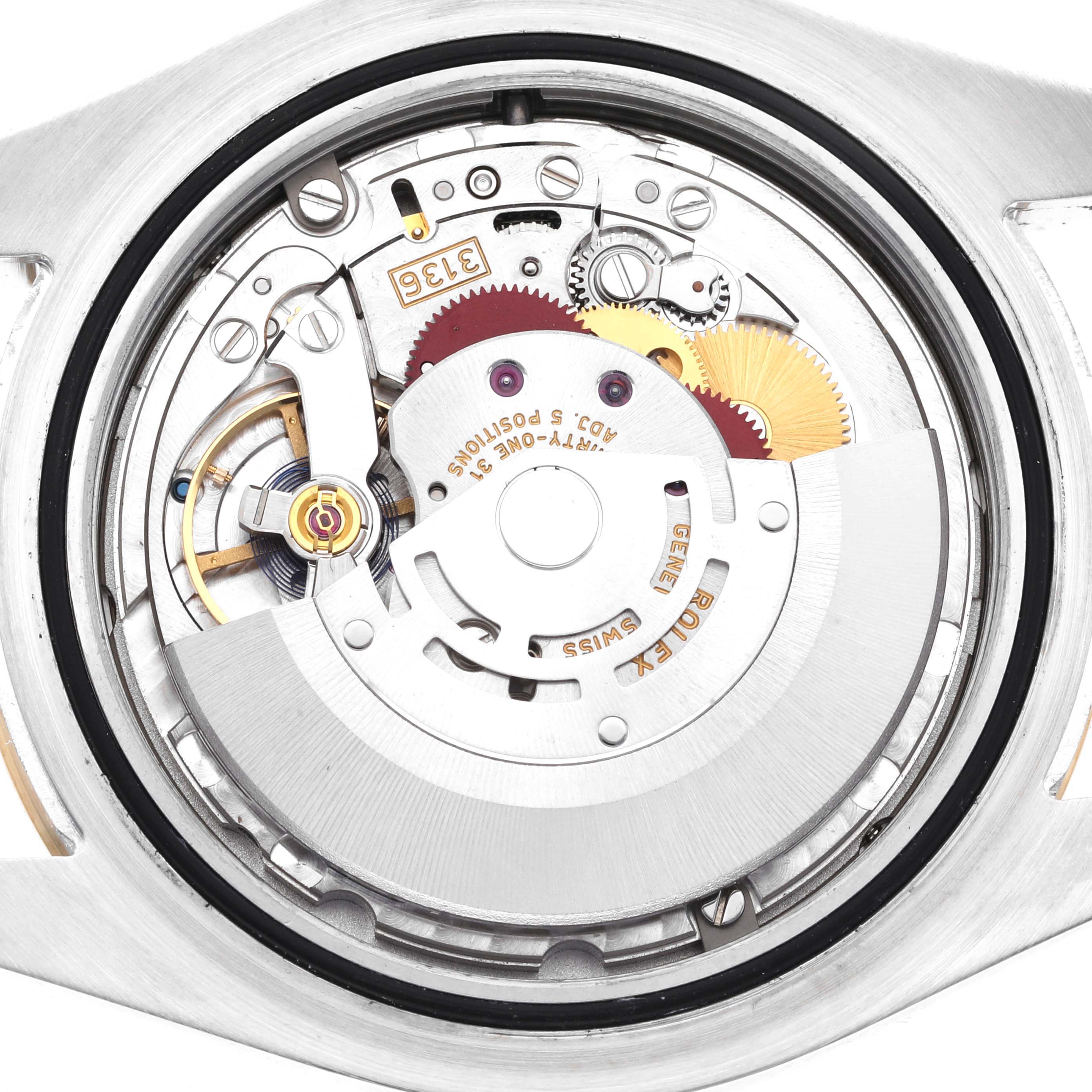 This image shows a close-up, rear view of the internal mechanical movement of a Rolex Datejust 116333 Men
s Steel and Gold (two tone) Champagne Dial 116333 Men
s Steel and Gold (two tone) Champagne Dial watch.
