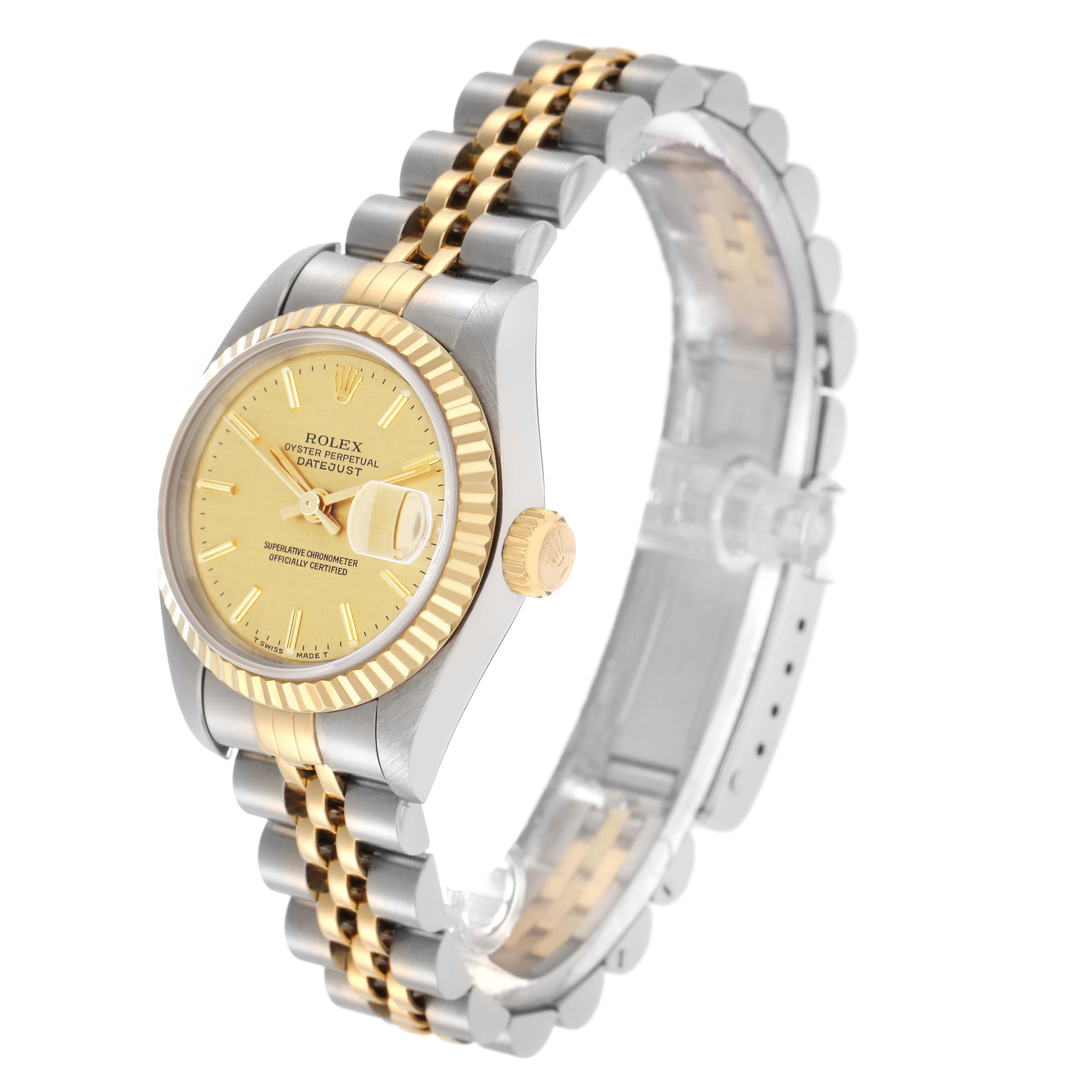 The image shows a Rolex Datejust model number 69173 from a front angle, highlighting the gold dial, fluted bezel, and two-tone Jubilee bracelet.