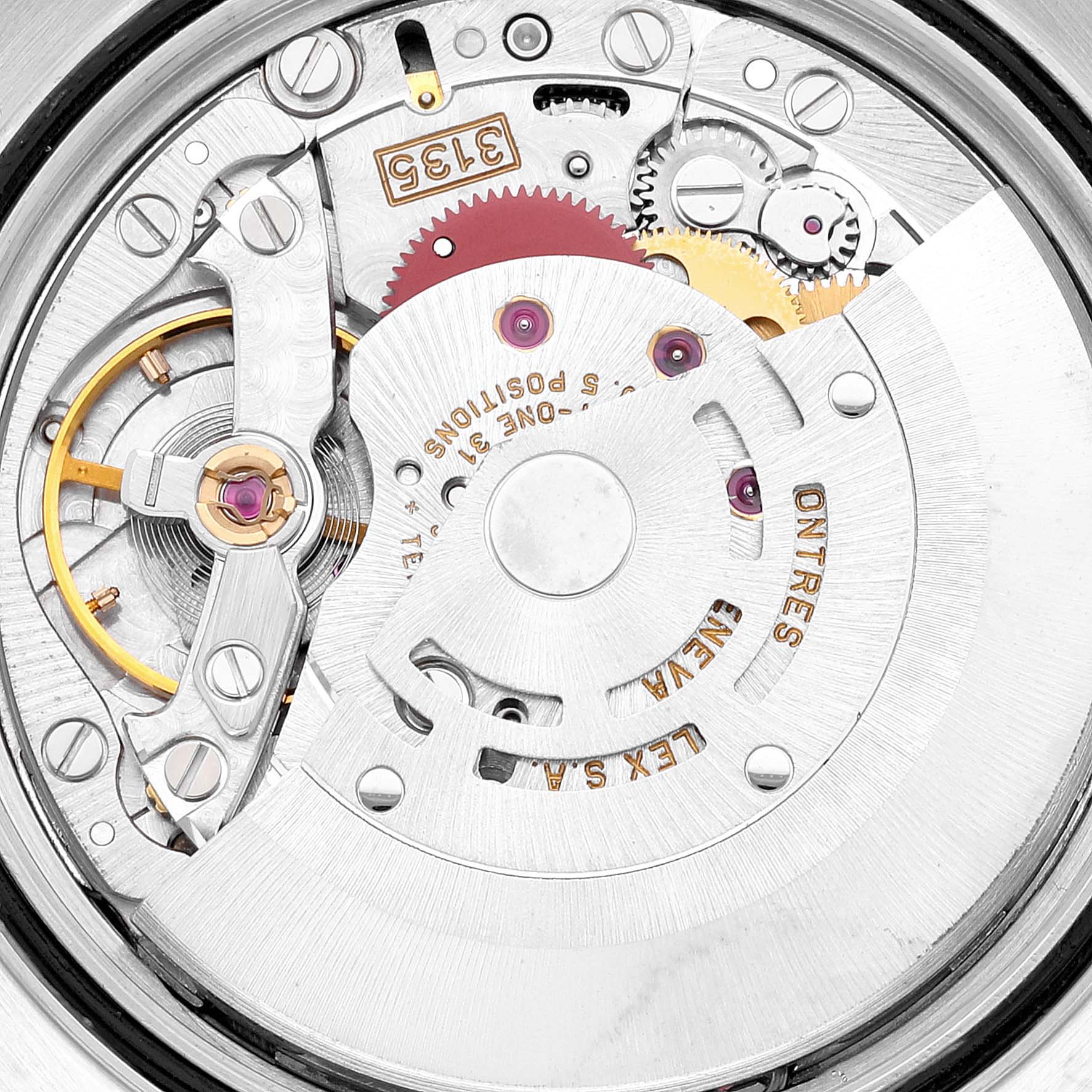 This is a close-up view of the inner mechanical movement of a Rolex Datejust 16233 Men's Steel and Gold (two tone) Champagne Dial 16233 Men's Steel and Gold (two tone) Champagne Dial watch, showcasing its intricate gears and components.