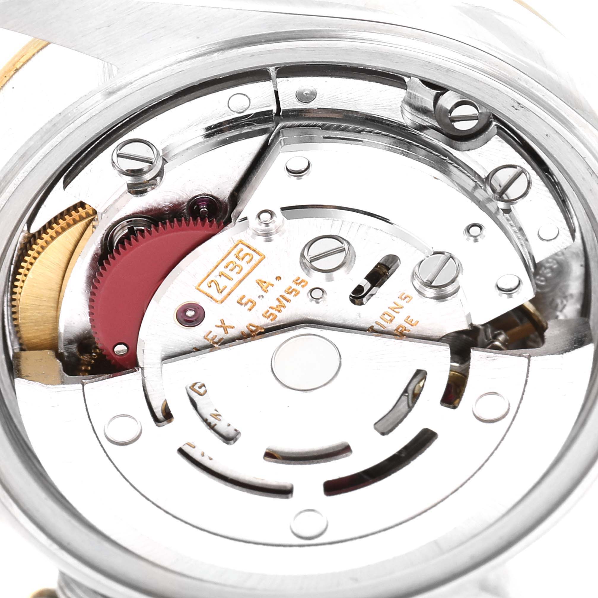 This image shows a close-up of the internal mechanism of a Rolex Datejust 69173 Women's Steel and Gold (two tone) Champagne Dial 69173 Women's Steel and Gold (two tone) Champagne Dial watch, highlighting its movement components.