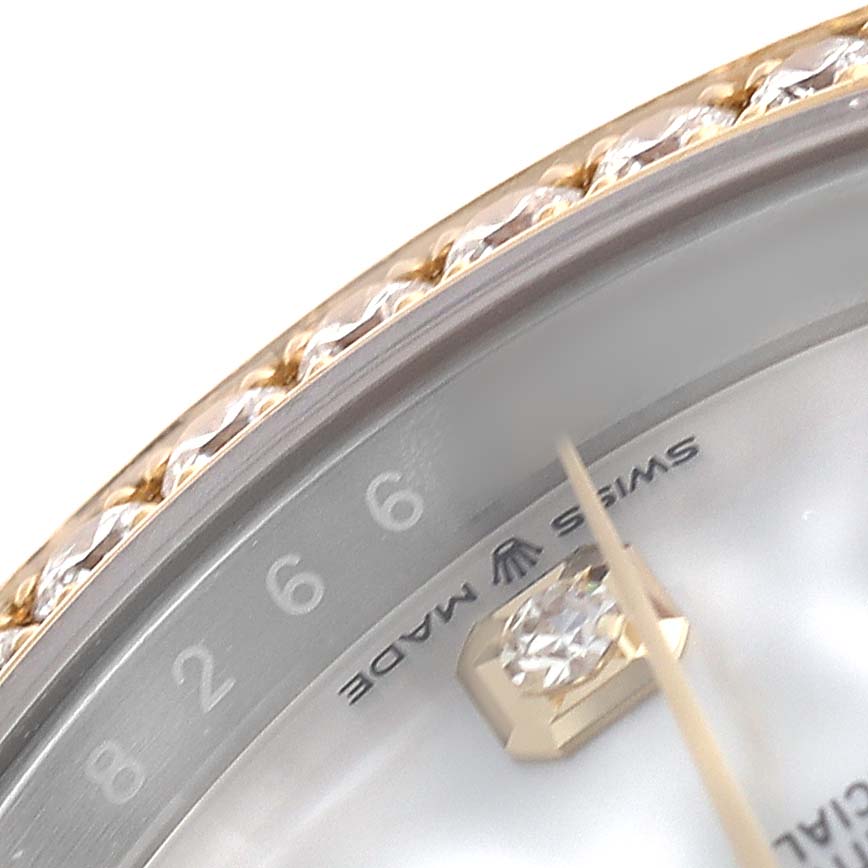 The image shows a close-up of the Rolex Datejust 126283 Men's Steel and Gold (two tone) Mother of Pearl Dial watch bezel and dial, highlighting the diamond marker and part of the second hand.