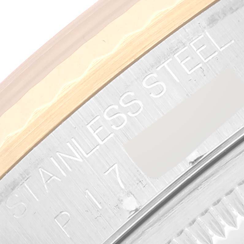 The image shows a close-up of the stainless steel bezel with inscription on a Rolex Datejust 16233 Men's Steel and Gold (two tone) Grey Dial 16233 Men's Steel and Gold (two tone) Grey Dial watch.