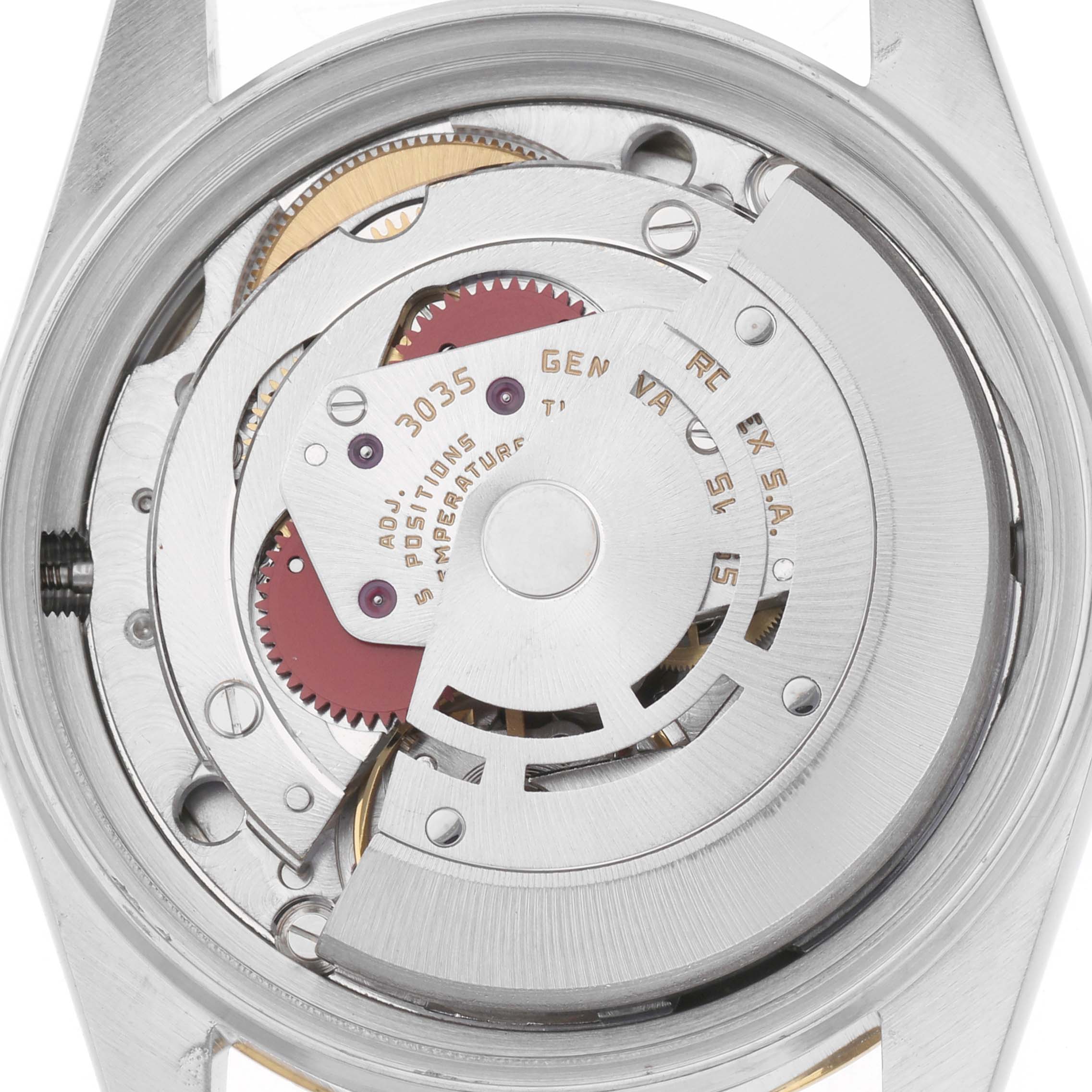 The image shows the movement of a Rolex Datejust model 16013, focusing on the inner mechanics from a top-down view.