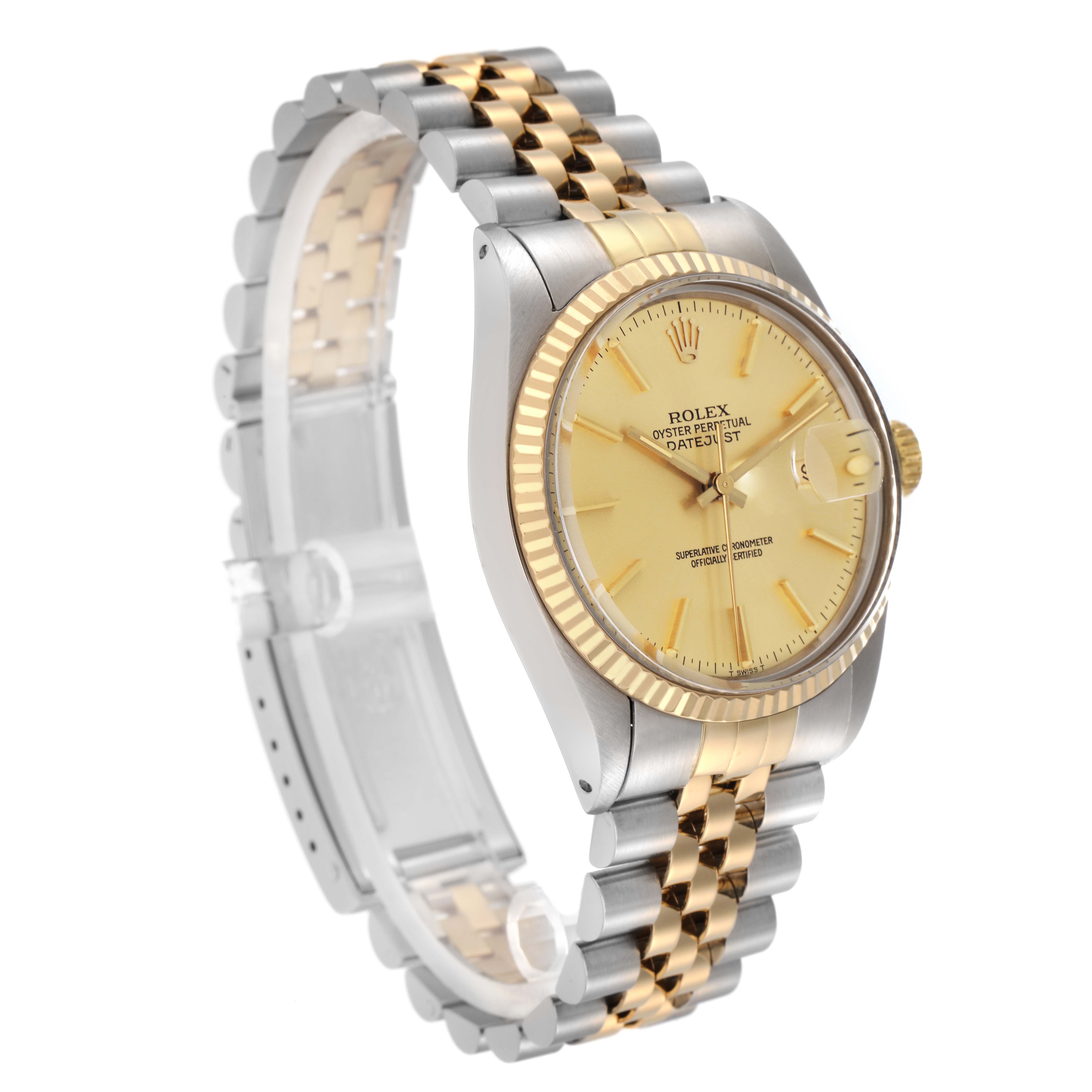 The Rolex Datejust model 16013 is shown at a three-quarter angle, highlighting the gold and silver Jubilee bracelet, fluted bezel, champagne dial, and cyclops date window.