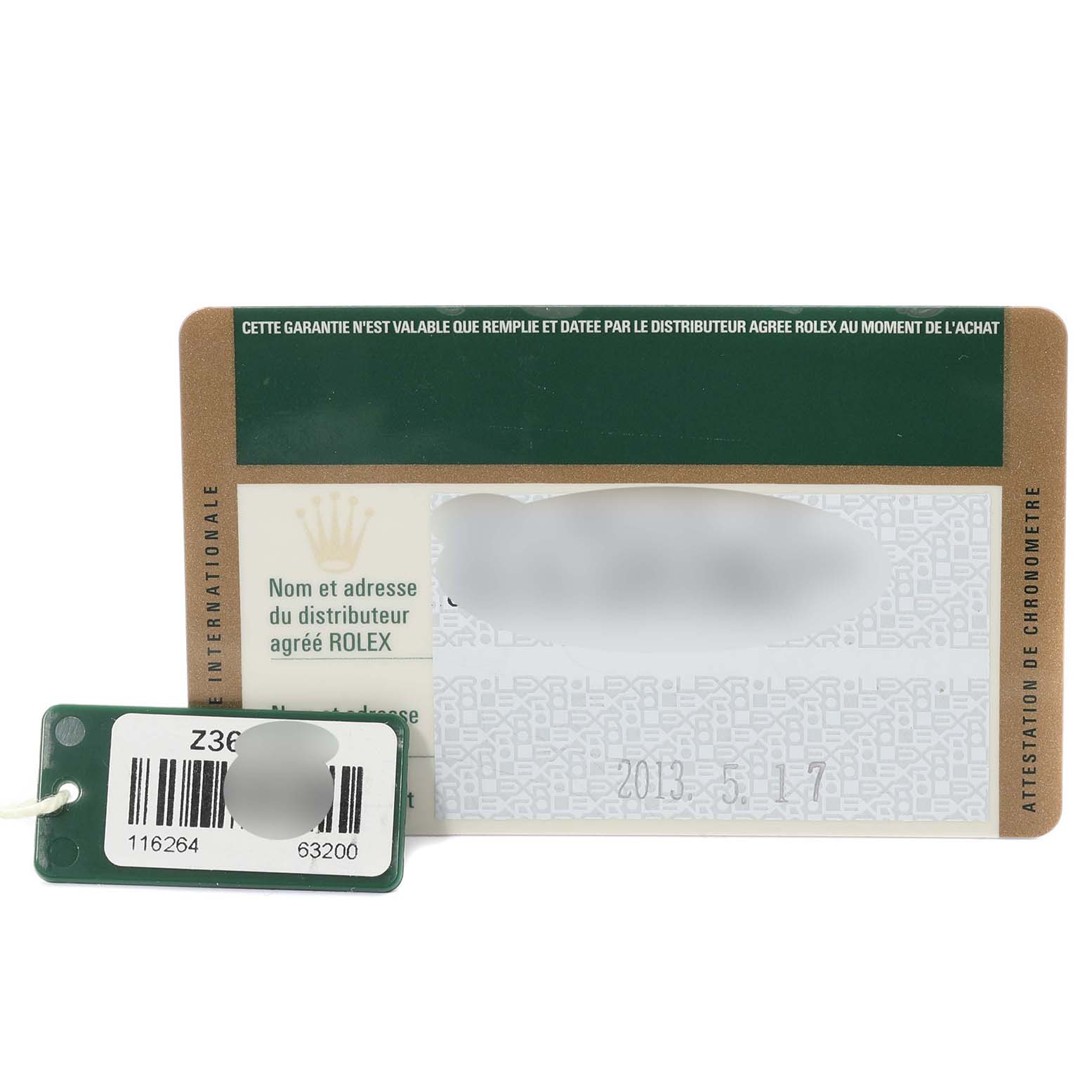 The image shows the warranty card and tag for a Rolex Turn-o-Graph 116264 Men's Stainless Steel Blue Dial 116264 Men's Stainless Steel Blue Dial watch.