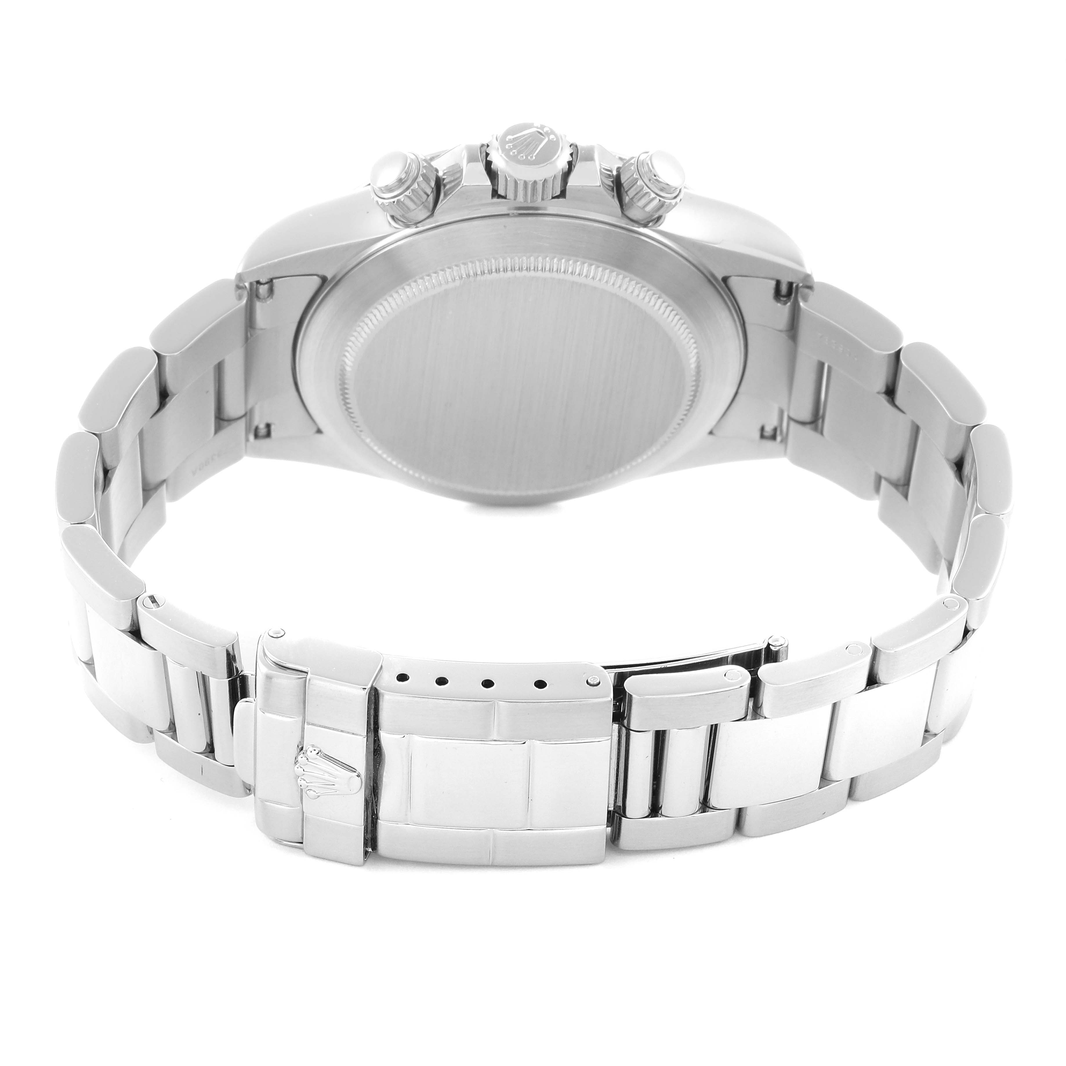 The image shows the backside of the Rolex Daytona model 16520 men's watch, focusing on the case back, clasp, and bracelet.