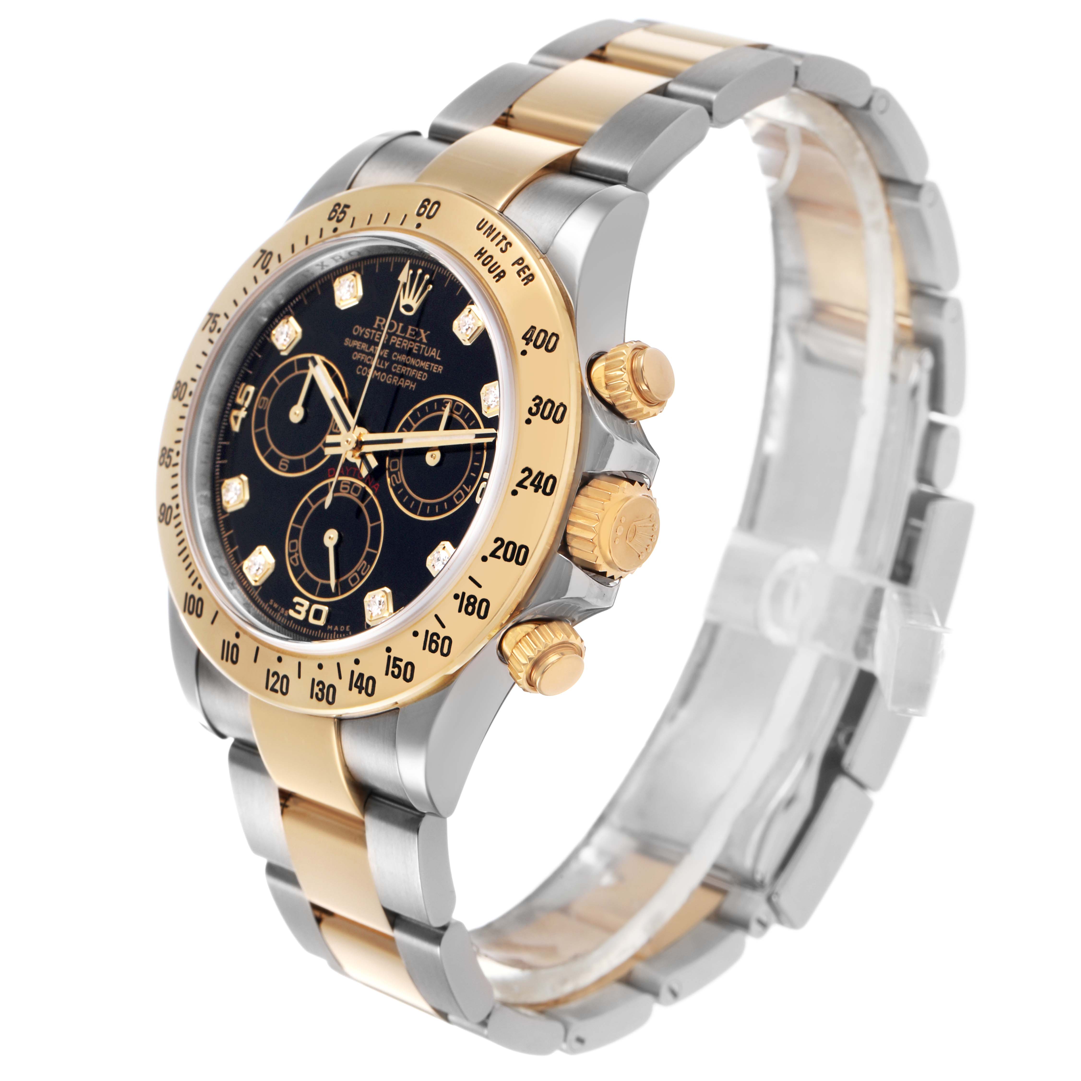 The Rolex Daytona 116523 Men's Steel and Gold (two tone) Black Dial watch is shown at a side angle, highlighting its gold and silver bracelet, bezel, dial, and pushers.
