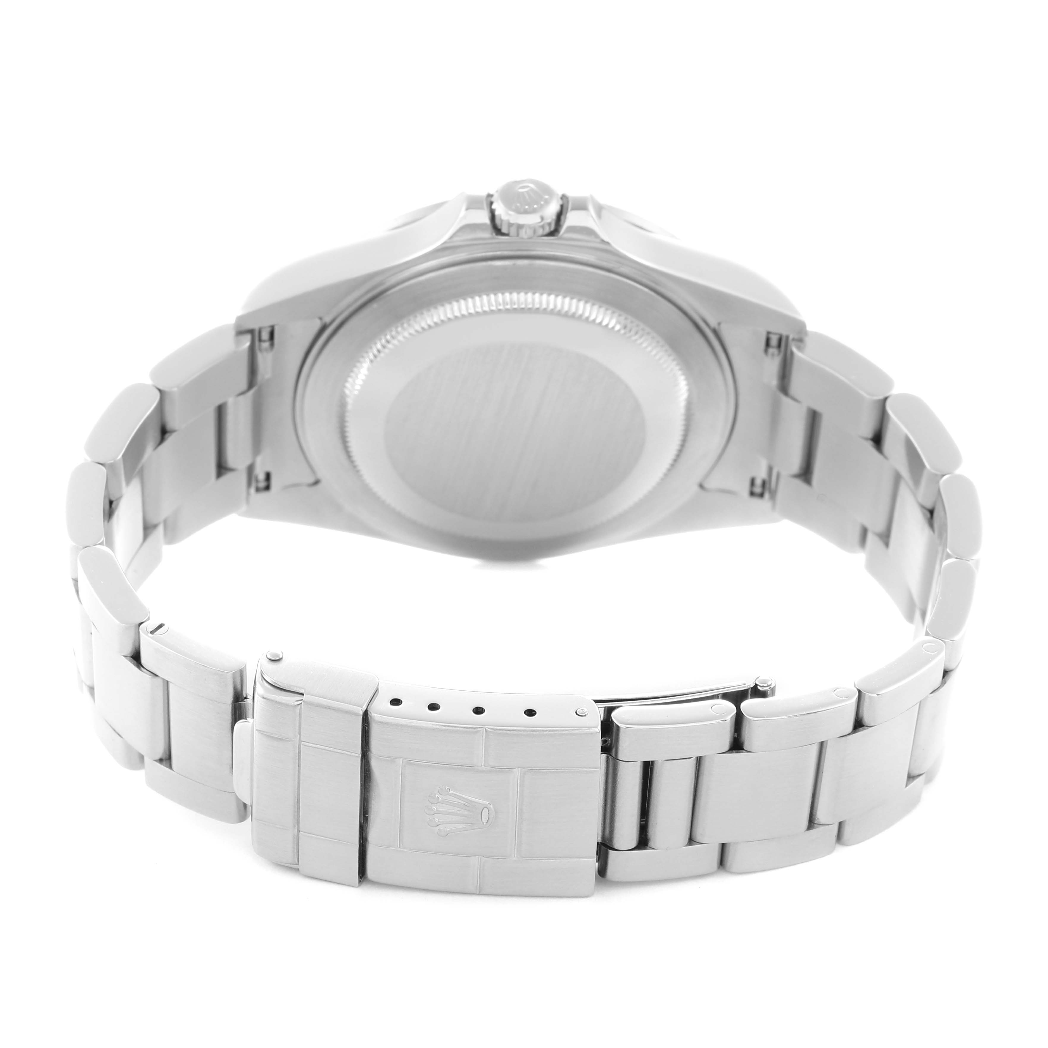 The image shows the back case and bracelet clasp of a Rolex Explorer model 216570 men's watch, viewed from the rear angle.