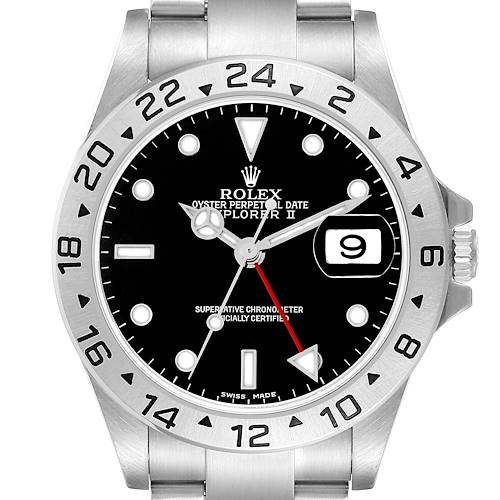 The Rolex Explorer model 216570 is shown from the front angle, highlighting its black dial, date window, silver bezel with 24-hour markers, and bracelet.