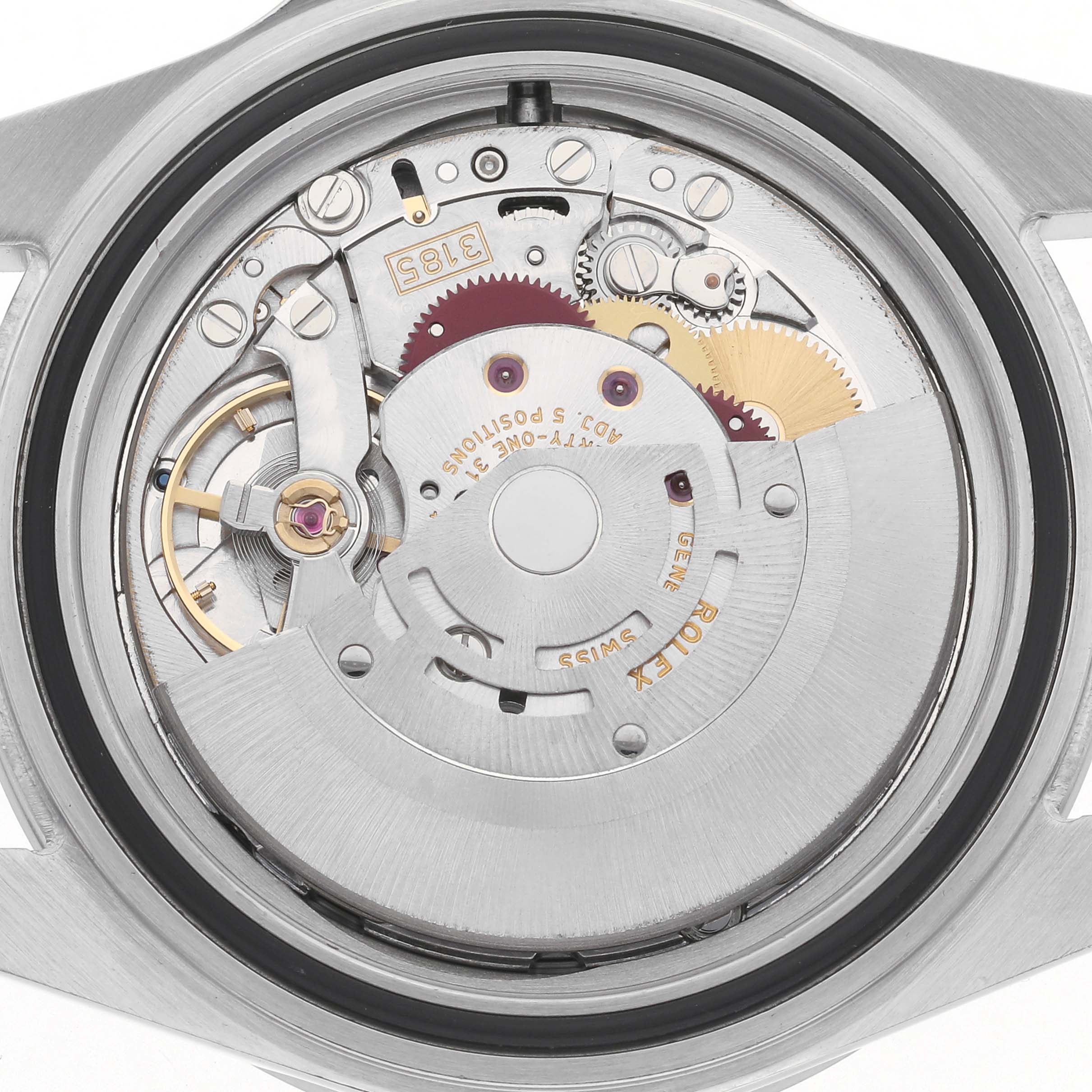 The image shows the back view of a Rolex Explorer model 216570, highlighting its mechanical movement components.