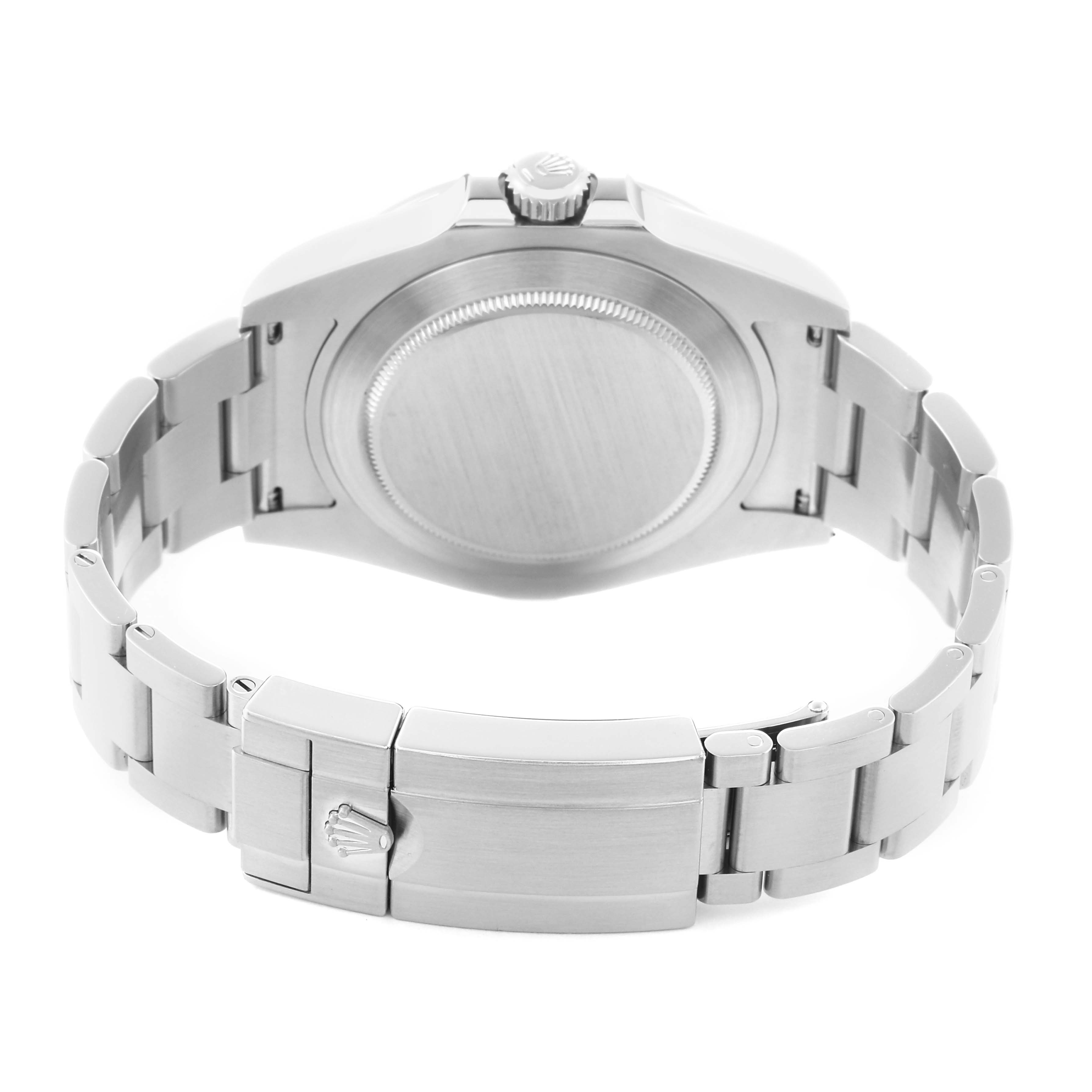 The image shows the back of the Rolex Explorer model 216570 men's watch, featuring its case back, crown, and stainless steel bracelet with a clasp.