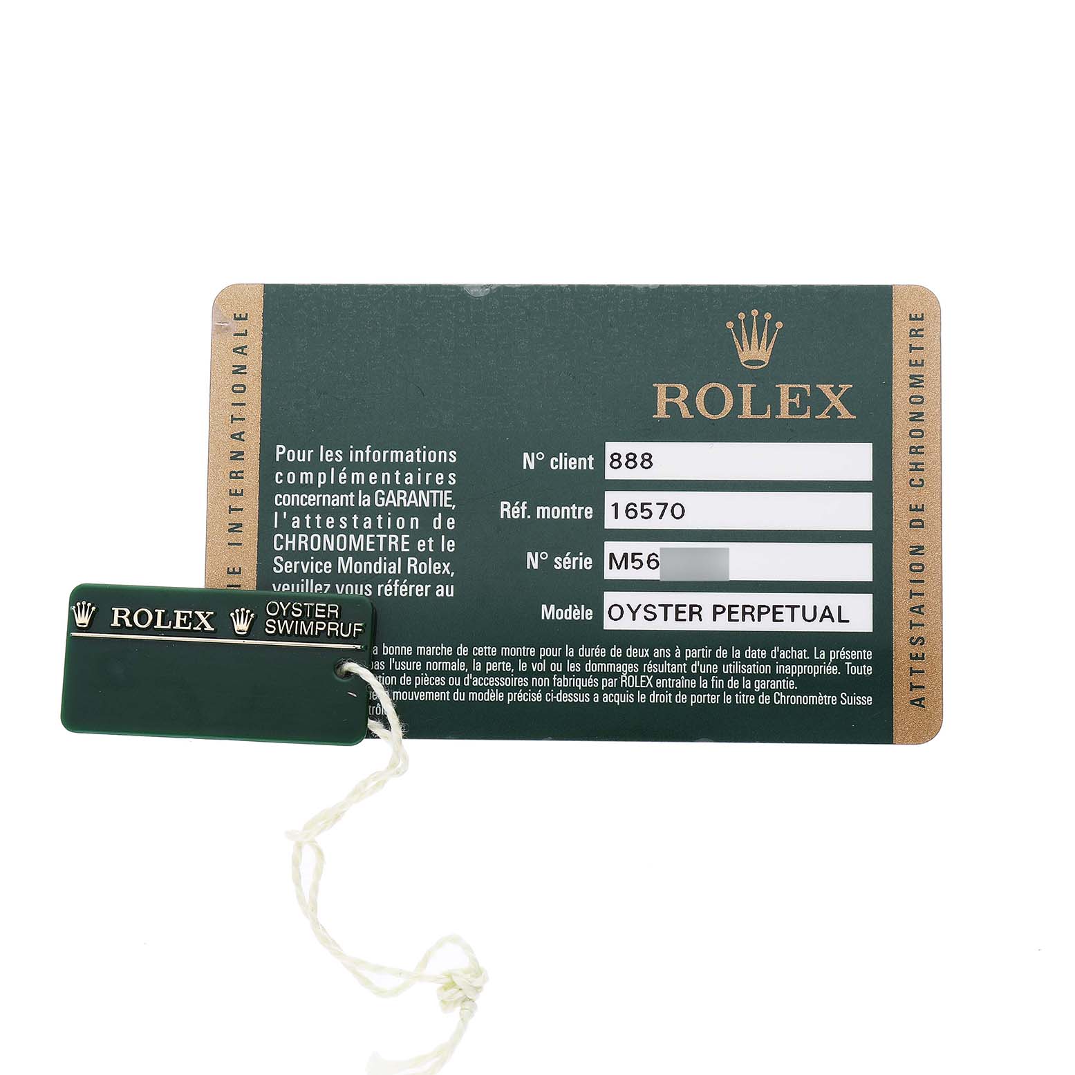 The image shows a Rolex Explorer 16570 T Men's Stainless Steel White Dial warranty card and a green tag with the "Oyster Swimpruf" label.