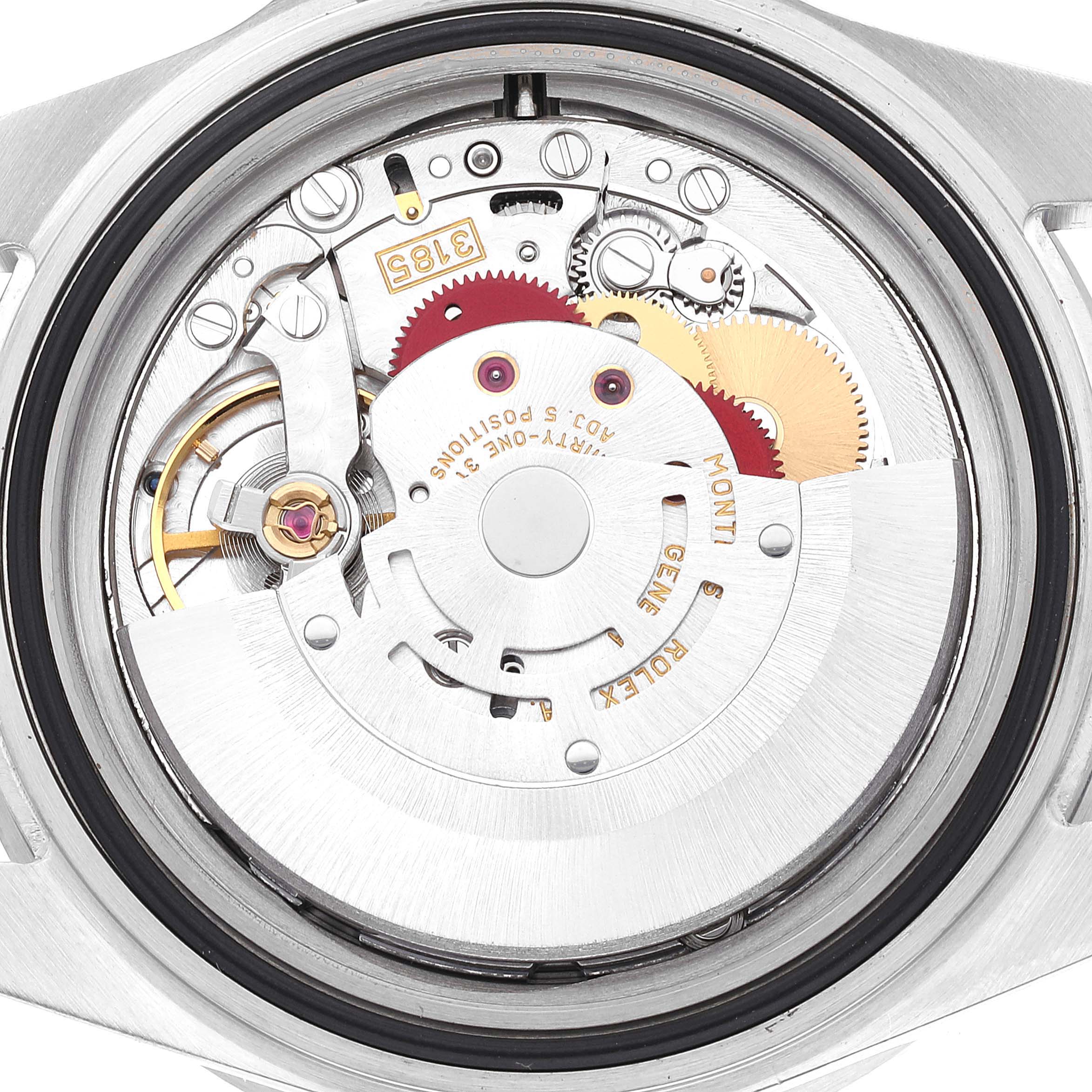 This image shows the inner mechanical movement of a Rolex GMT-Master 16710 Men
s Stainless Steel Black Dial 16710 Men
s Stainless Steel Black Dial watch from an angled view, revealing gears and rotor.