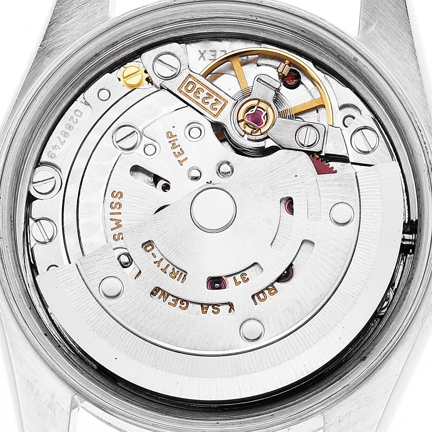 The image shows the inner movement of a Rolex Oyster Perpetual 76080 Men's Stainless Steel Pink Dial watch from a top-down angle, highlighting its mechanical components.