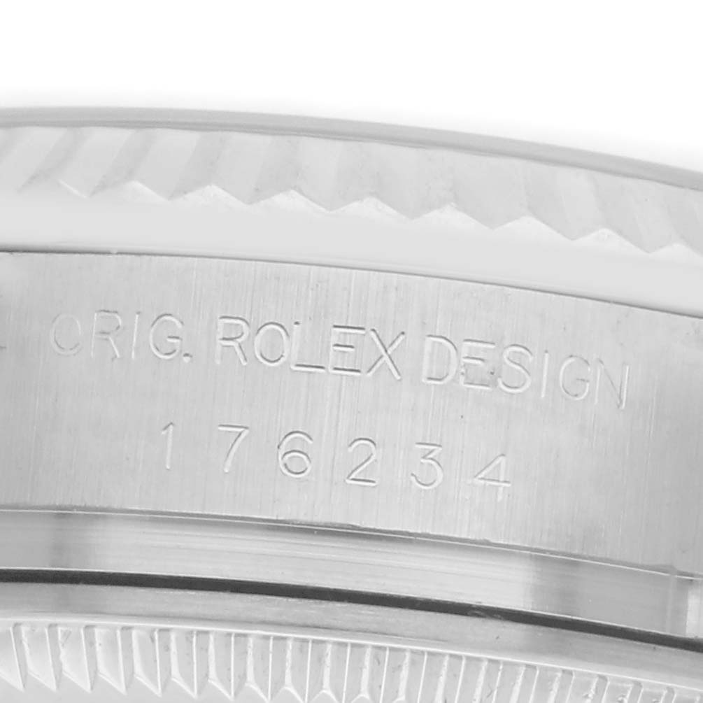 The image shows a close-up side angle of the case of a Rolex Oyster Perpetual, model number 176234, highlighting the engraved branding and model number.