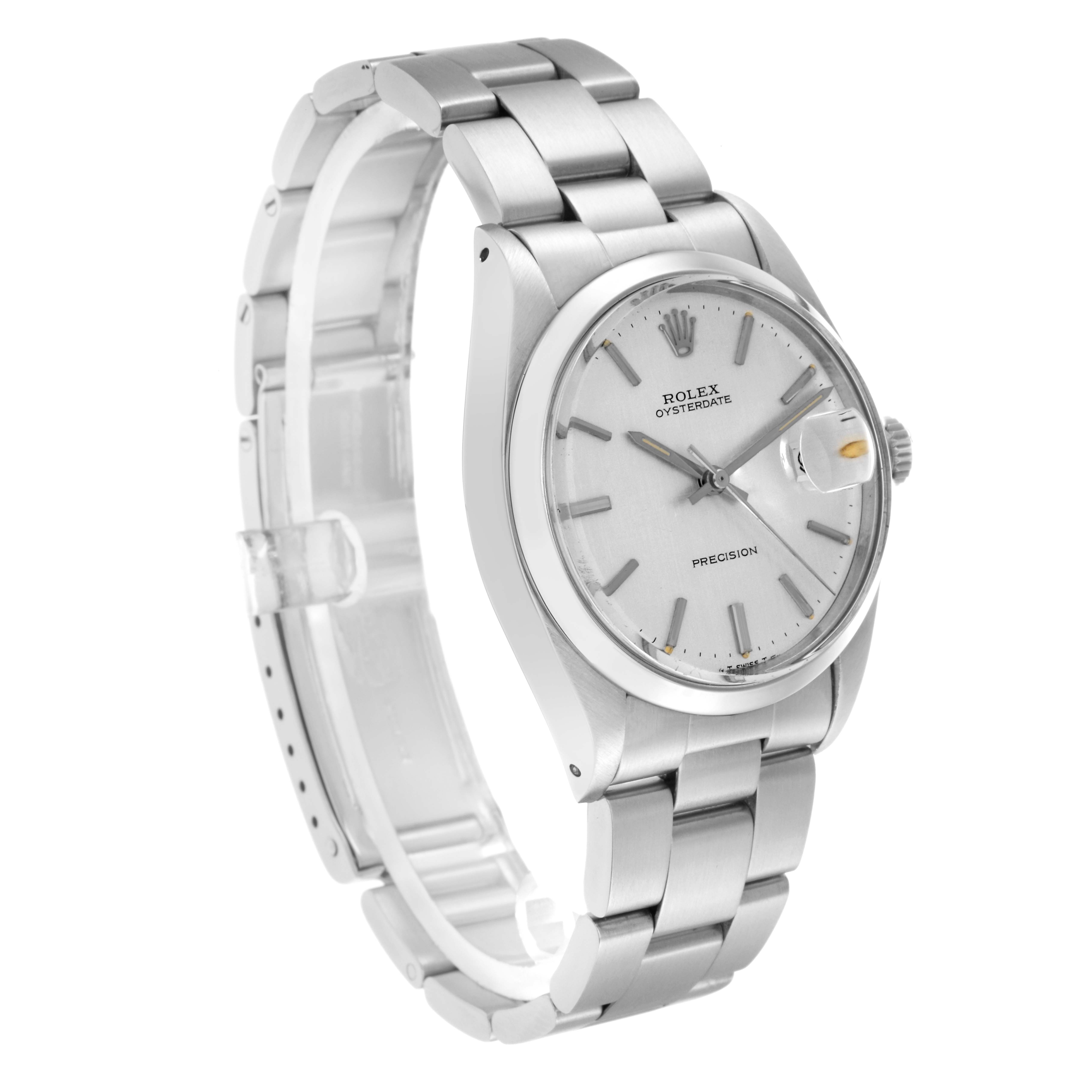 The Rolex Date model 6694 men's watch is shown at a slight angle, highlighting the dial, hour markers, bracelet, and clasp.