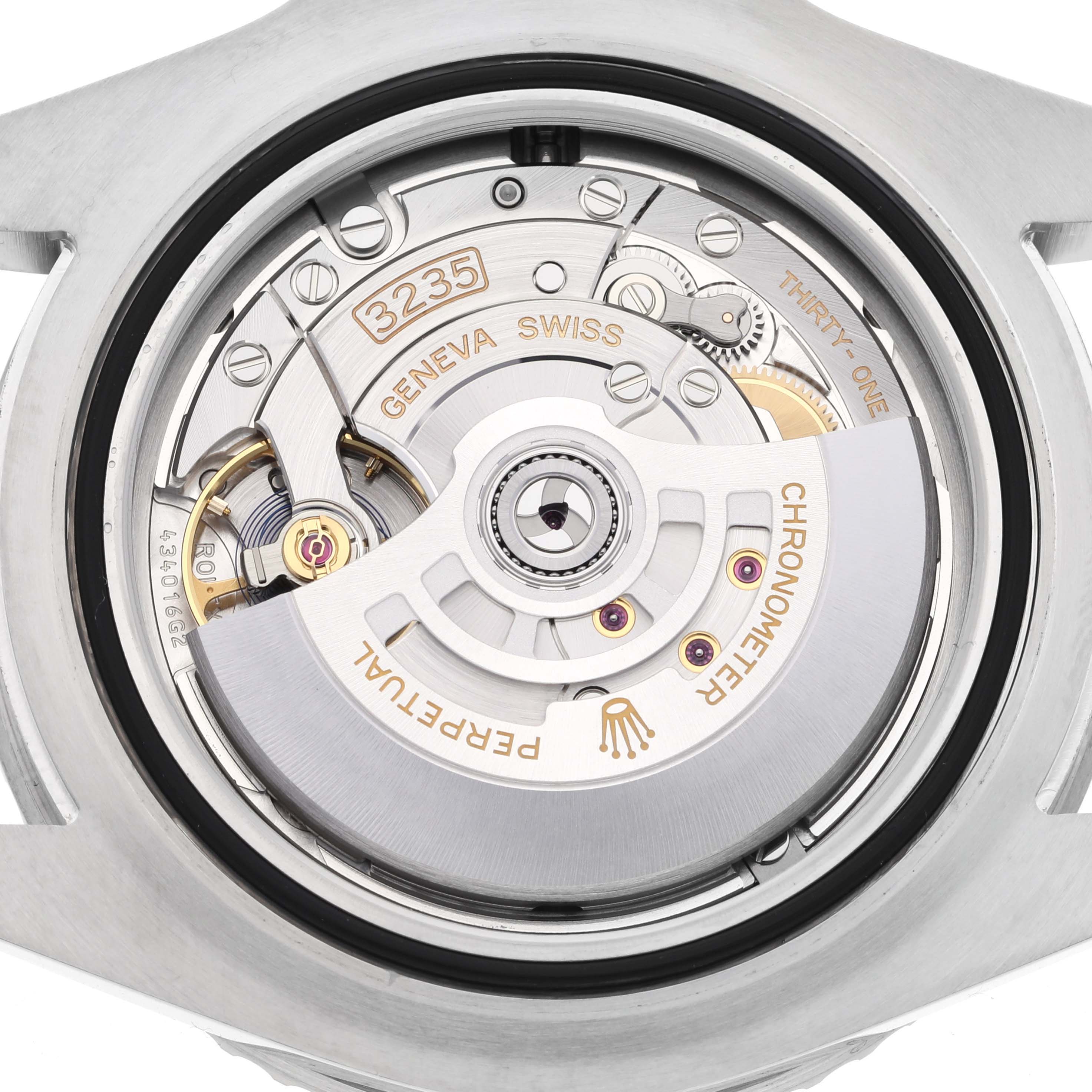 This image shows the movement and inner workings of a Rolex Sea-Dweller 126600 Men
s Stainless Steel Black Dial 126600 Men
s Stainless Steel Black Dial watch, emphasizing the 3235 caliber and "Perpetual" rotor.