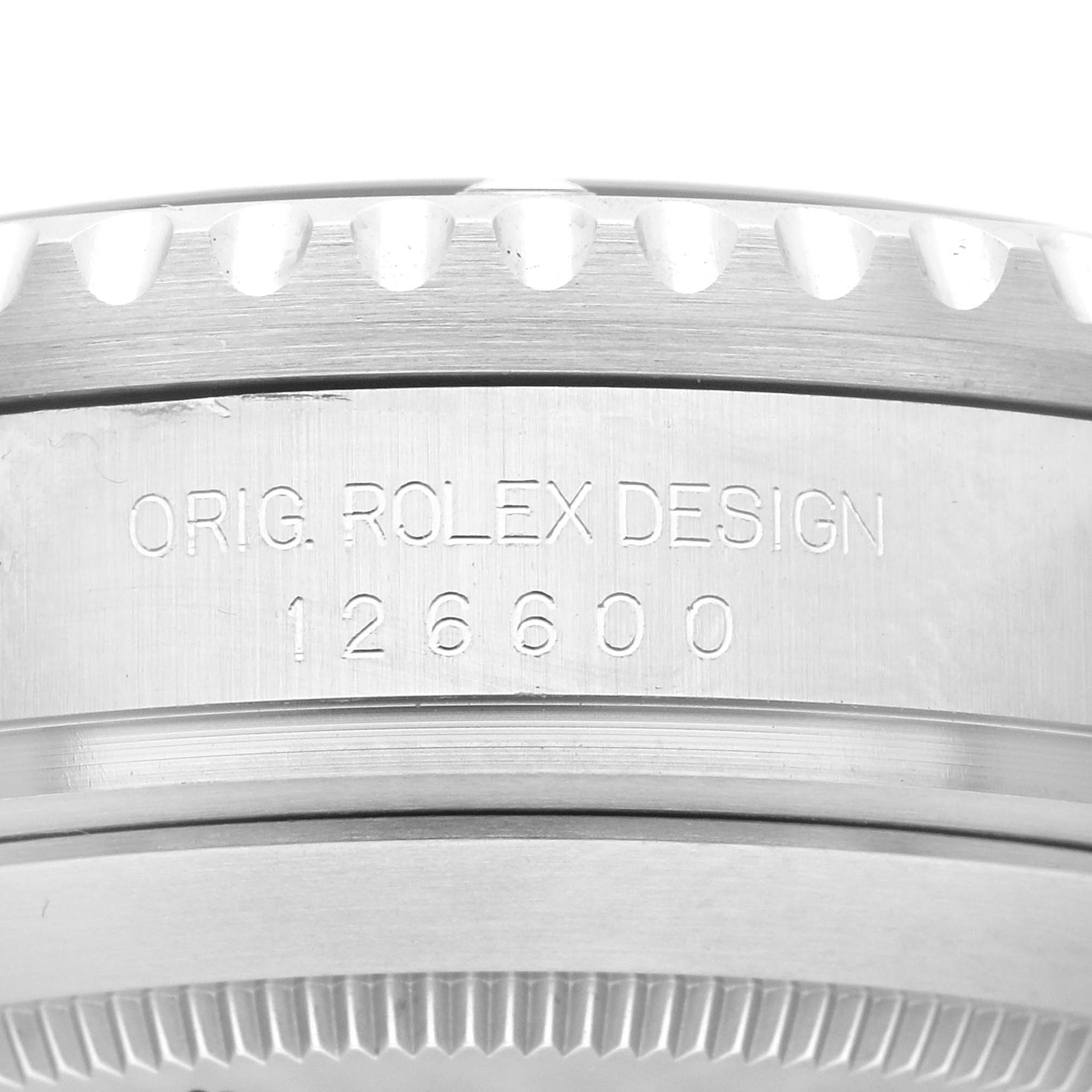 This image shows a close-up of the case side of the Rolex Sea-Dweller 126600 Men
s Stainless Steel Black Dial 126600 Men
s Stainless Steel Black Dial watch, featuring the model number 126600 and the text "ORIG. ROLEX DESIGN."