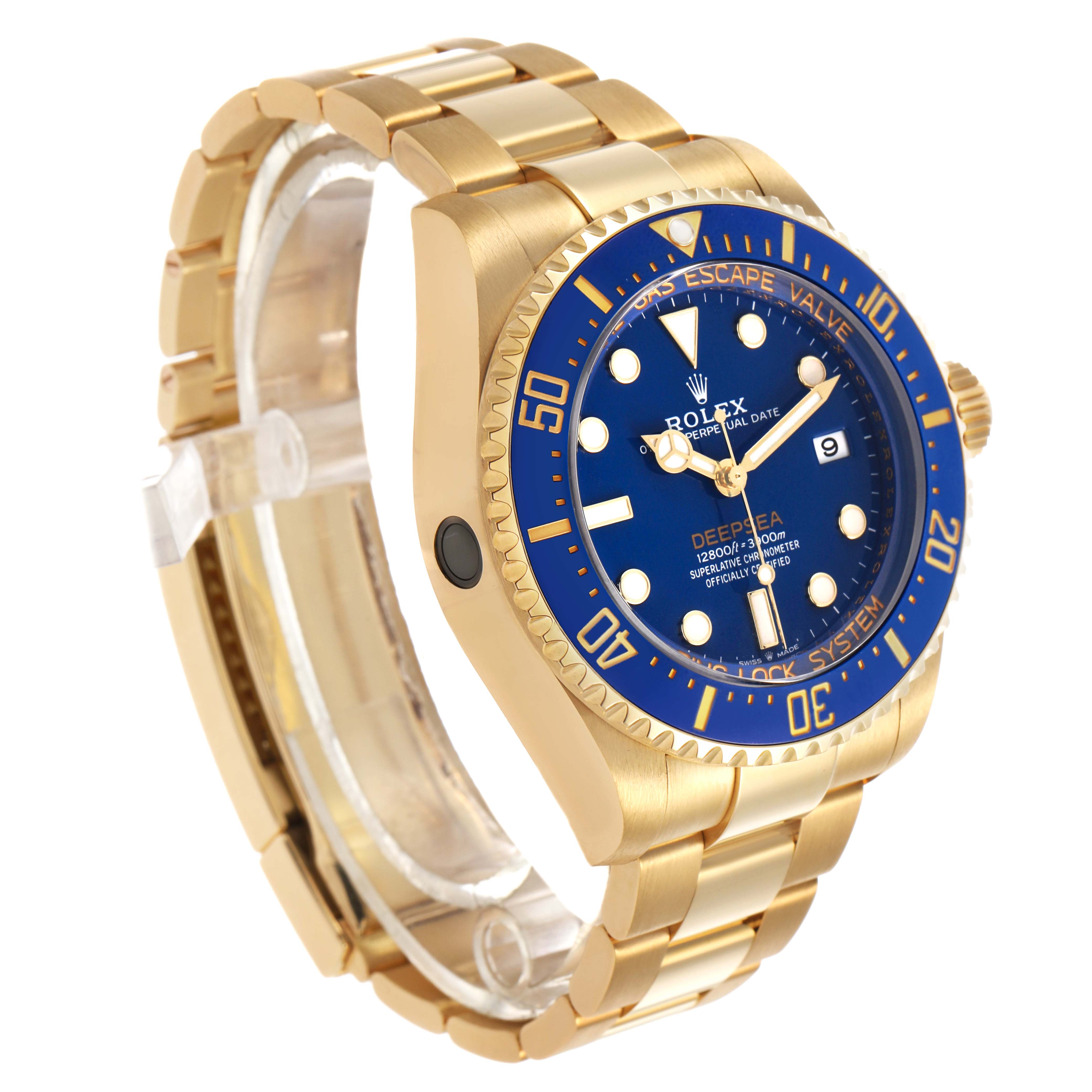 The Rolex Sea-Dweller 136668LB Men's Yellow Gold Blue Dial is shown at an oblique angle, highlighting its blue dial, bezel, and gold bracelet.