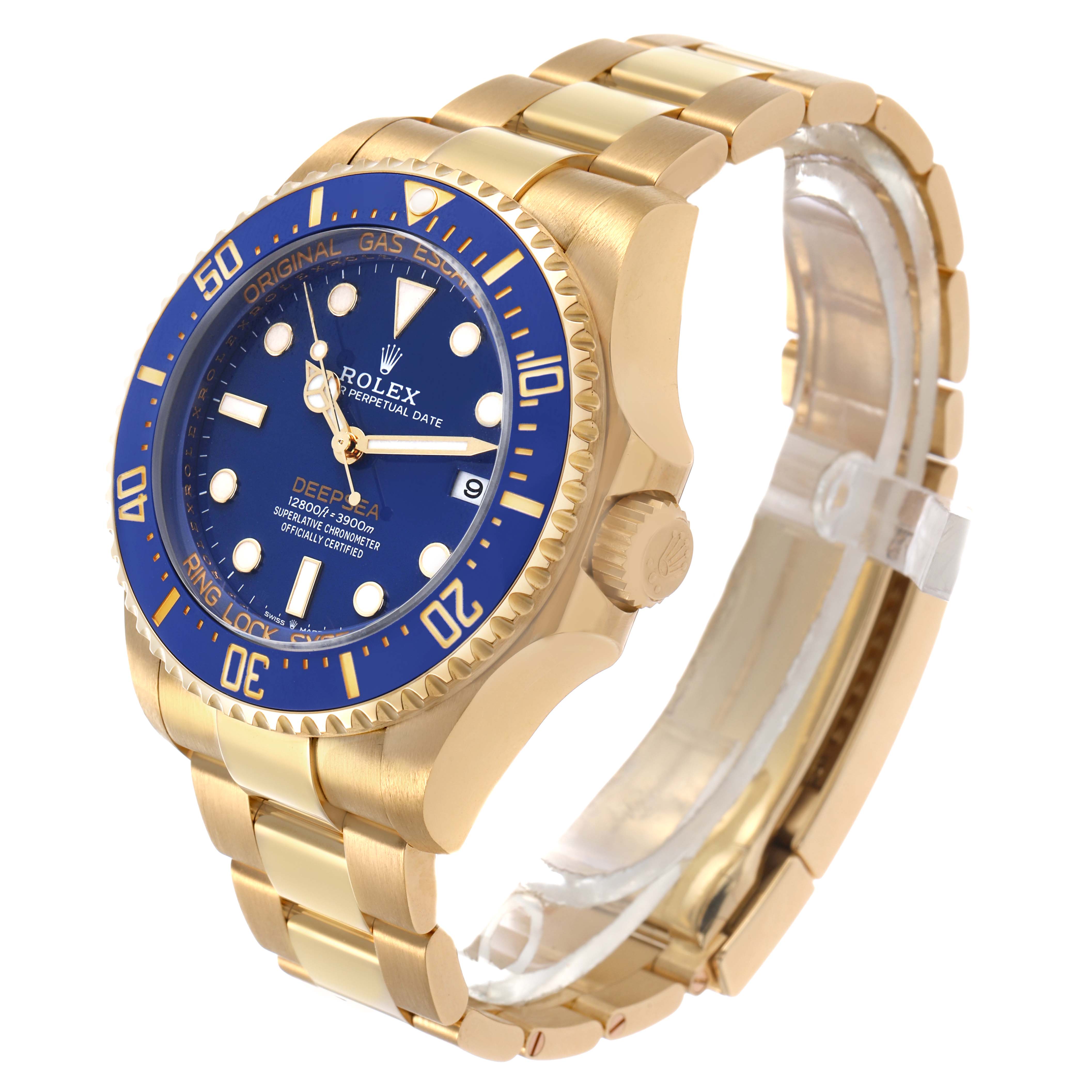 The image shows a side angle of a Rolex Sea-Dweller 136668LB Men's Yellow Gold Blue Dial watch highlighting the blue dial, gold bezel, bracelet, and crown.