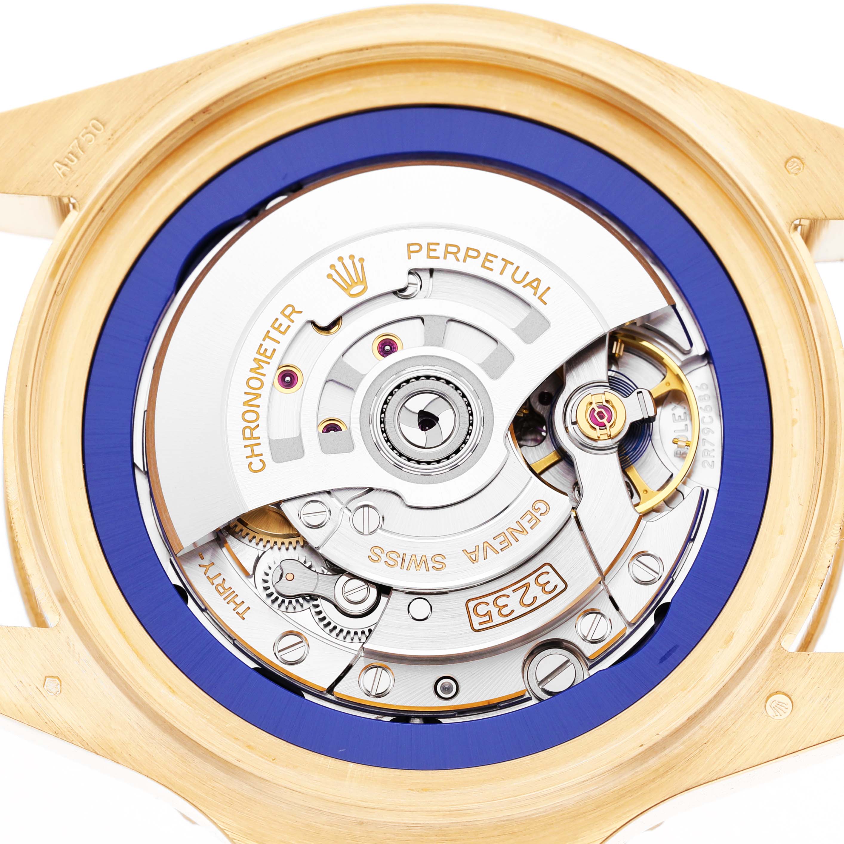 The image shows the back view of a Rolex Sea-Dweller 136668LB Men's Yellow Gold Blue Dial, highlighting its intricate automatic movement and components.