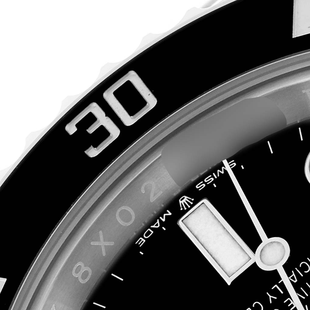 This is a close-up image of the dial and bezel of a Rolex Submariner 126610 Men
s Stainless Steel Black Dial 126610 Men
s Stainless Steel Black Dial watch, focusing on the 30-minute mark.