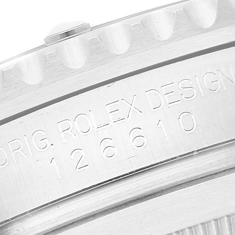 This image shows a close-up of the case side of a Rolex Submariner 126610 Men
s Stainless Steel Black Dial 126610 Men
s Stainless Steel Black Dial, highlighting the engraved model number "126610" and "ROLEX DESIGN".