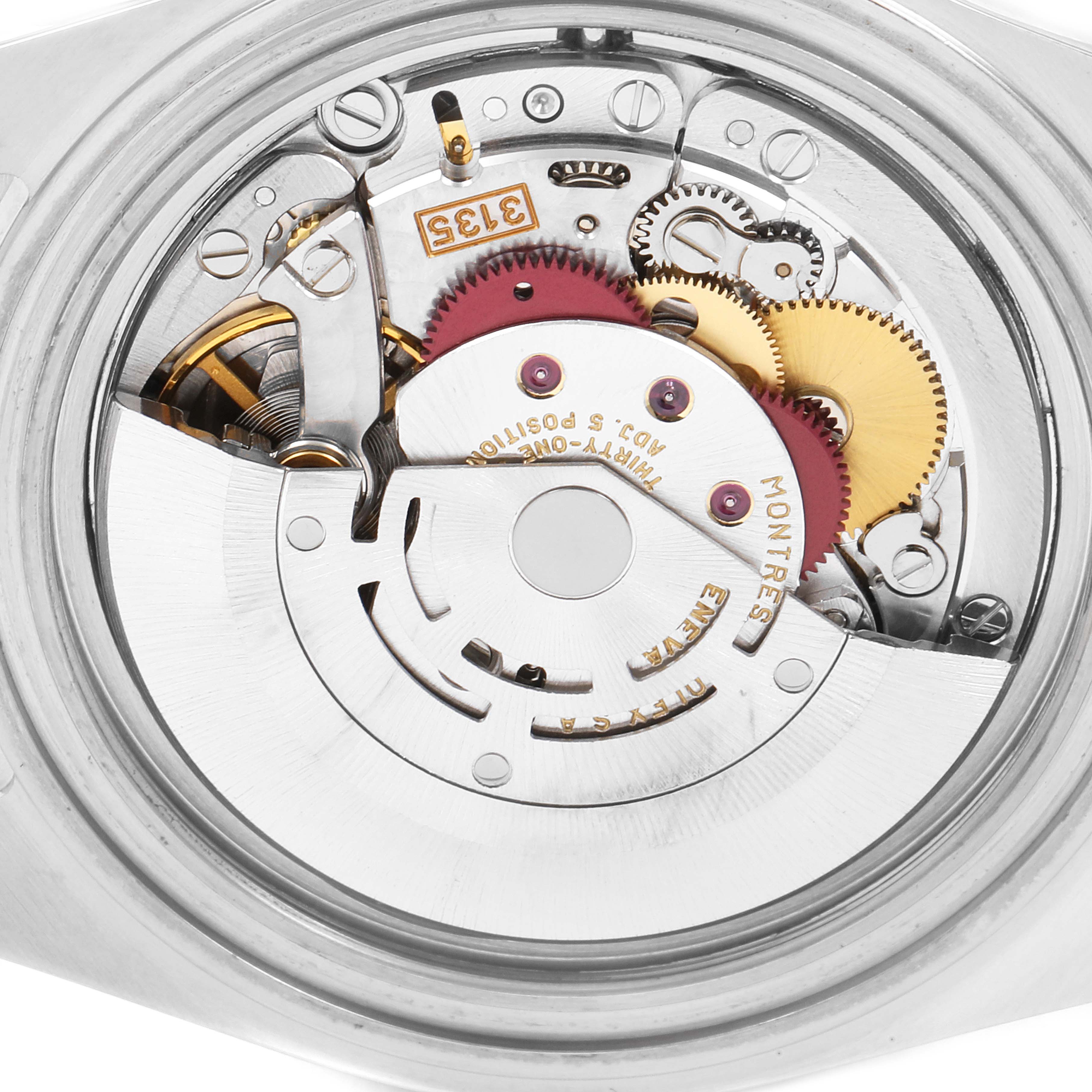 This image shows the internal mechanics of a Rolex Submariner 16613 Men's Steel and Gold (two tone) Blue Dial 16613 Men's Steel and Gold (two tone) Blue Dial watch viewed from the back.