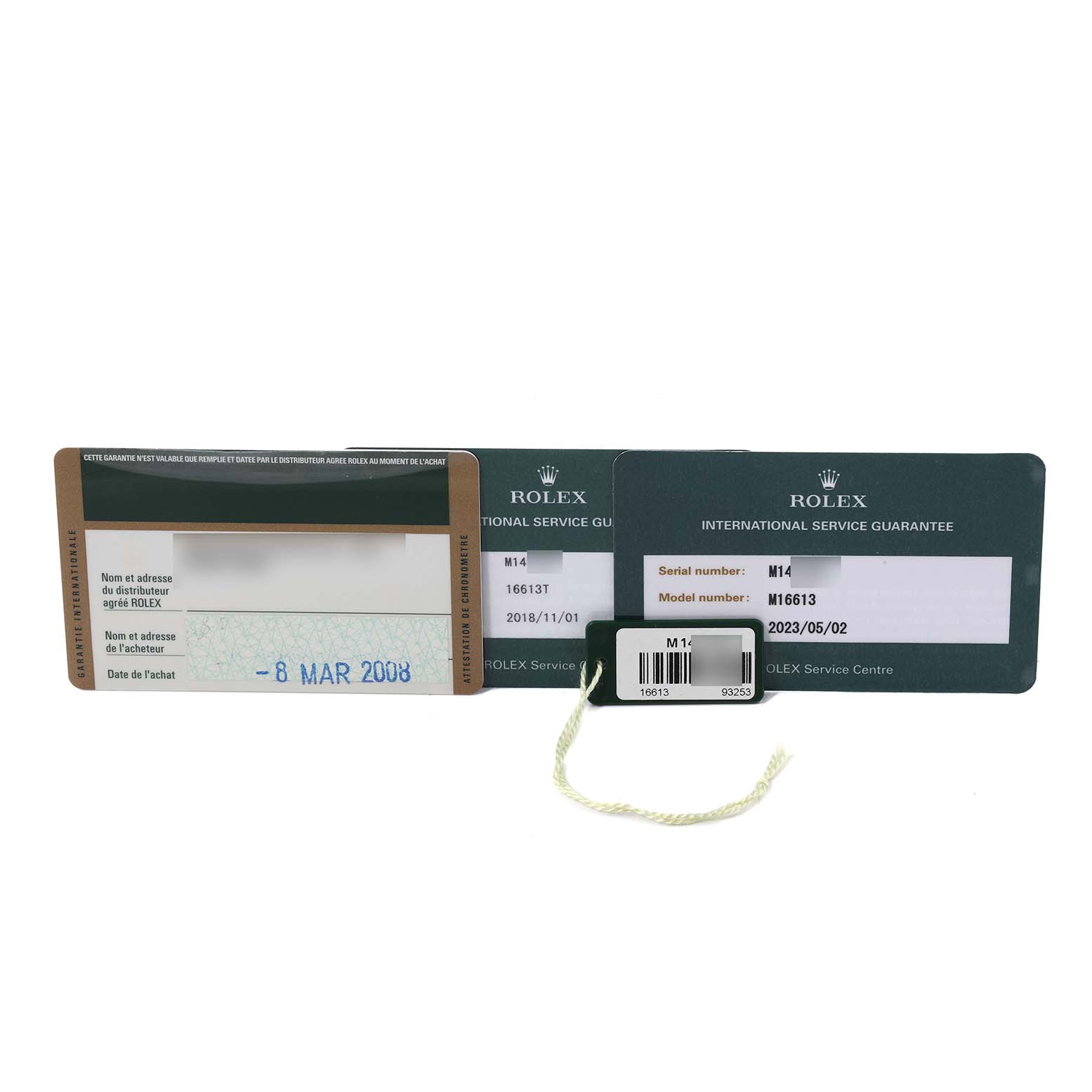 The image shows the warranty card and international service guarantee for a Rolex Submariner 16613 Men's Steel and Gold (two tone) Blue Dial 16613 Men's Steel and Gold (two tone) Blue Dial model M16613.