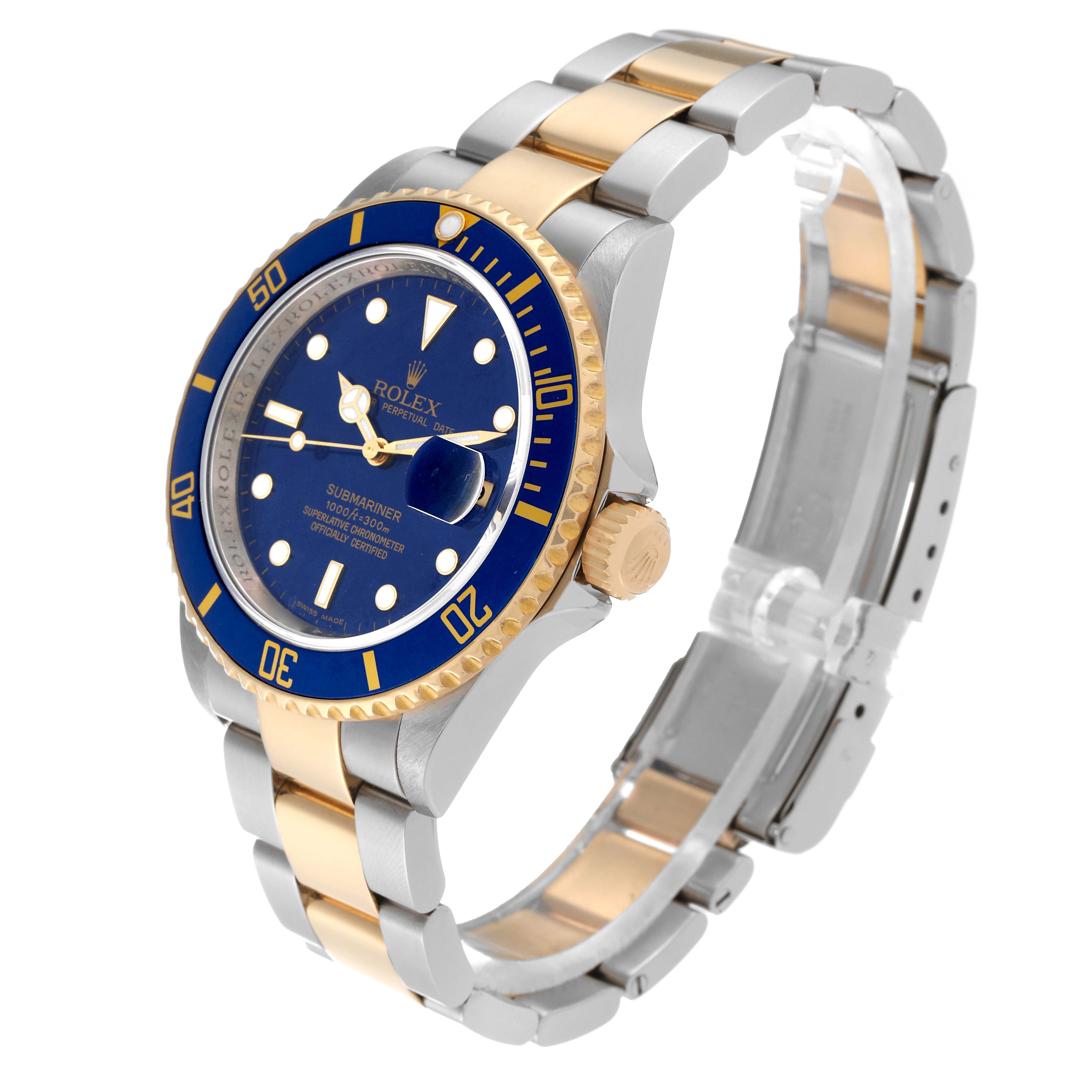 The Rolex Submariner 16613 Men's Steel and Gold (two tone) Blue Dial 16613 Men's Steel and Gold (two tone) Blue Dial watch is shown at an angle highlighting the bezel, dial, crown, and two-tone bracelet.