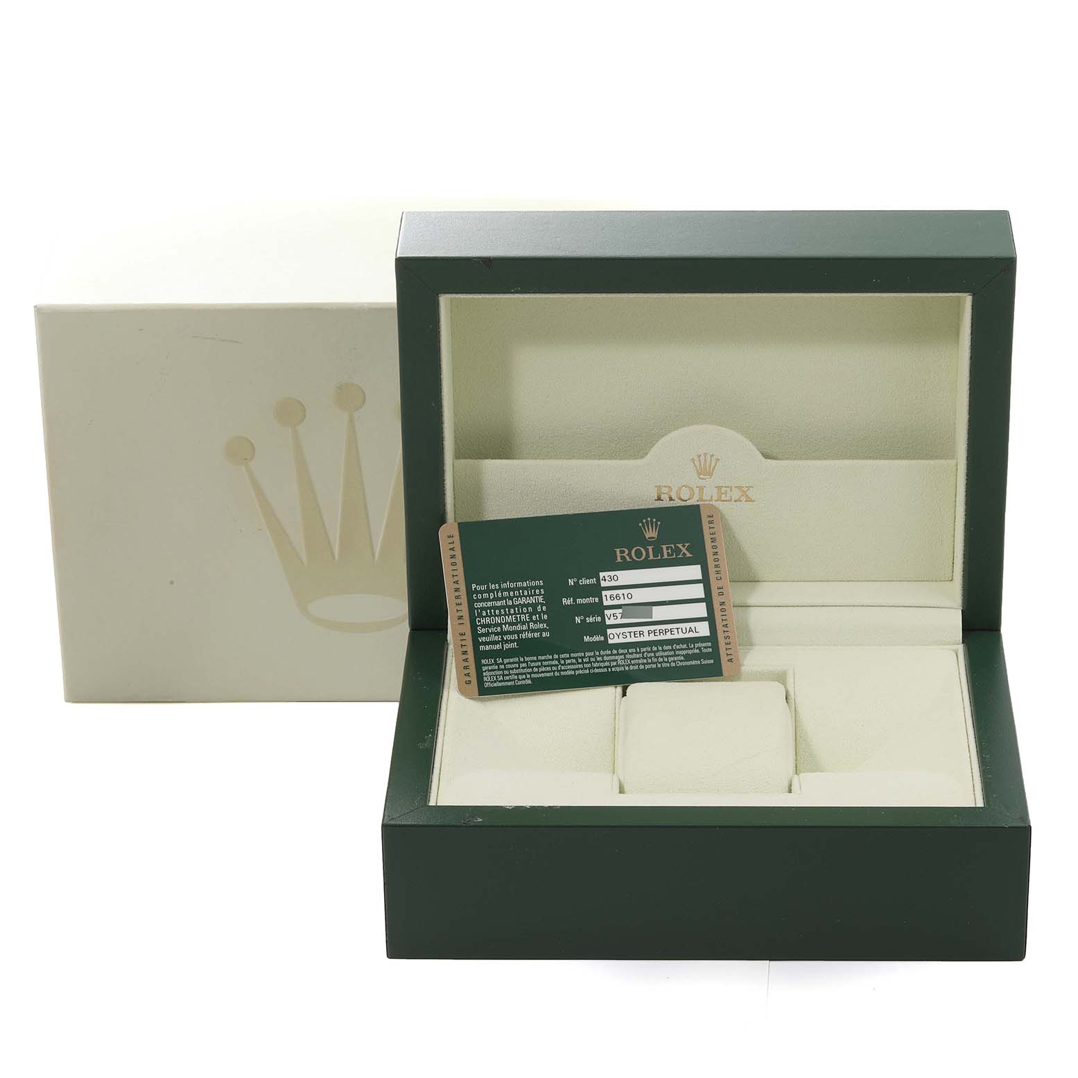 The image shows a Rolex Submariner 16610 Men
s Stainless Steel Black Dial 16610 Men
s Stainless Steel Black Dial watch box with its open lid and accompanying warranty card.