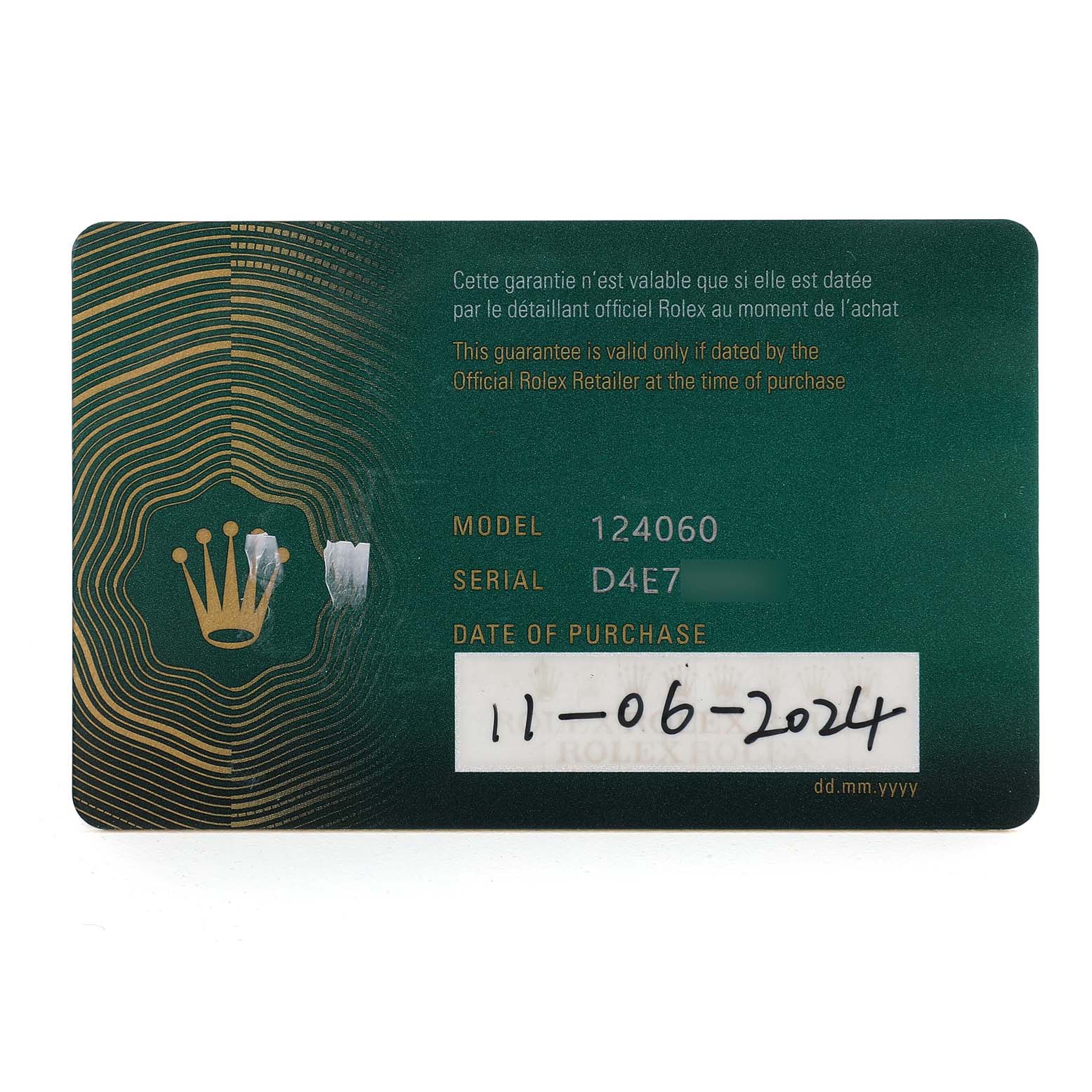 This image shows a warranty card for the Rolex Submariner M124060-0001 Men's Stainless Steel Black Dial, model 124060.
