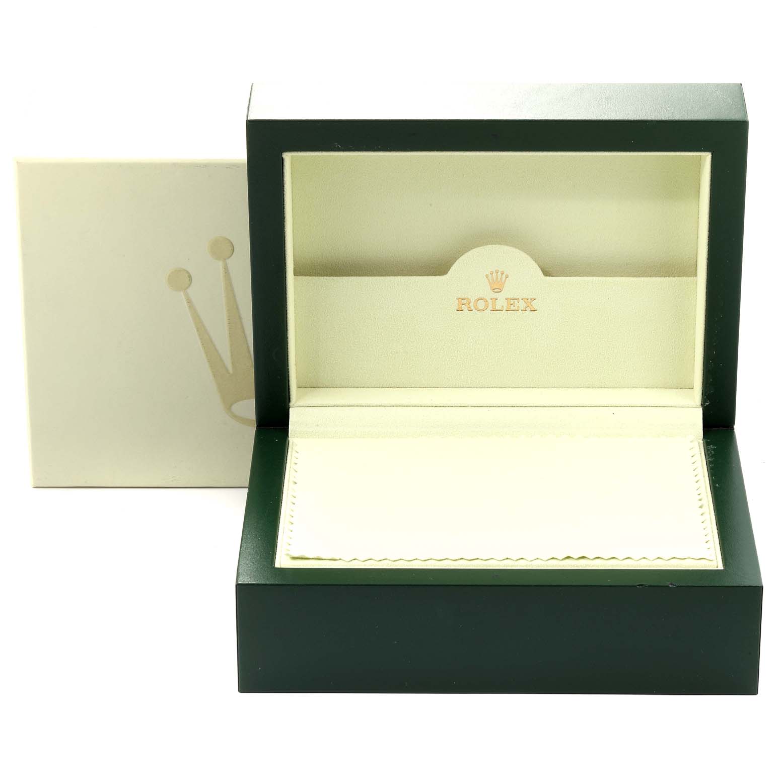 The image shows an open green and beige Rolex box for a Submariner model, angled to display the interior compartment and lid branding.