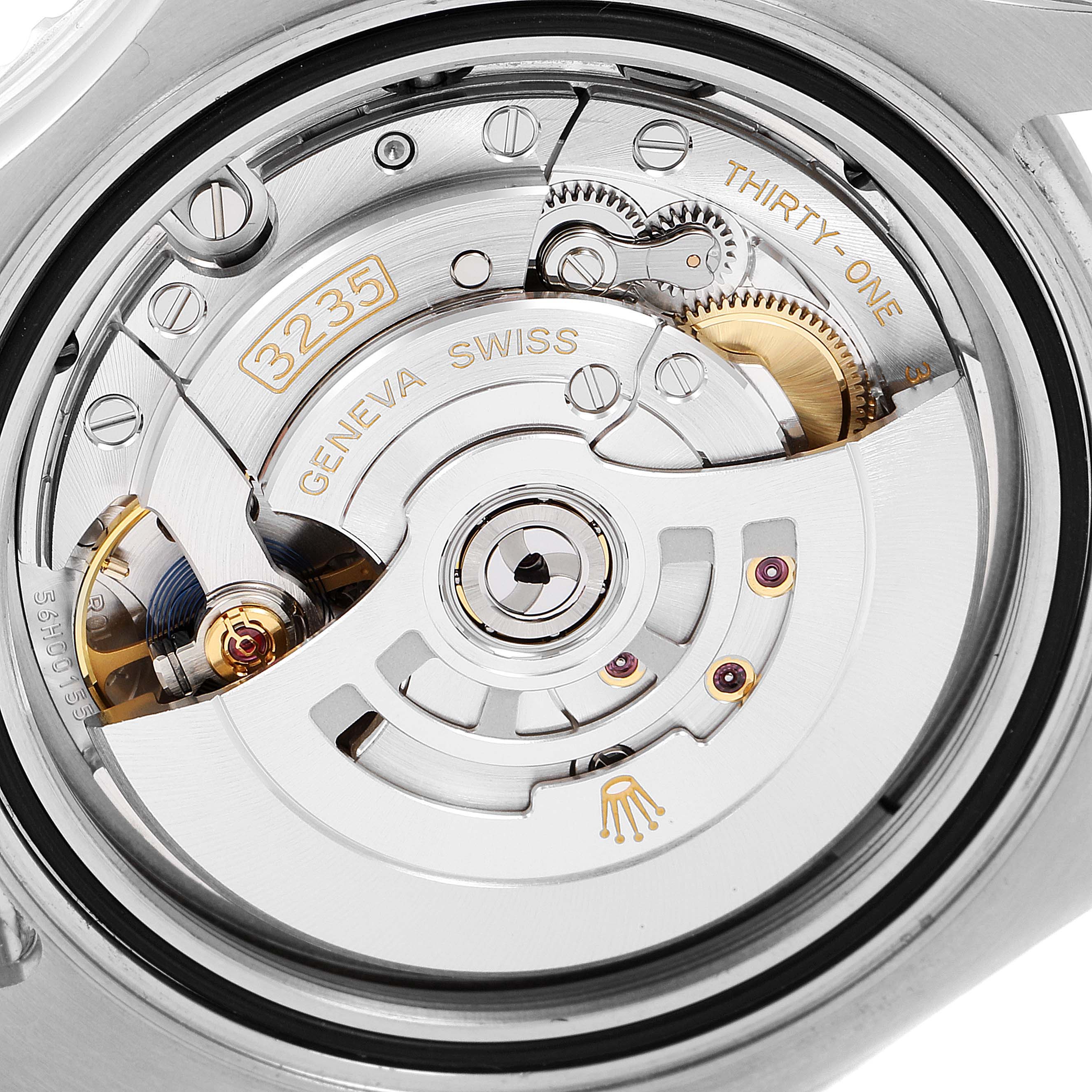 The image shows a close-up view of the movement mechanism of a Rolex Yacht-Master 126622 Men
s Stainless Steel Blue Dial 126622 Men
s Stainless Steel Blue Dial watch.